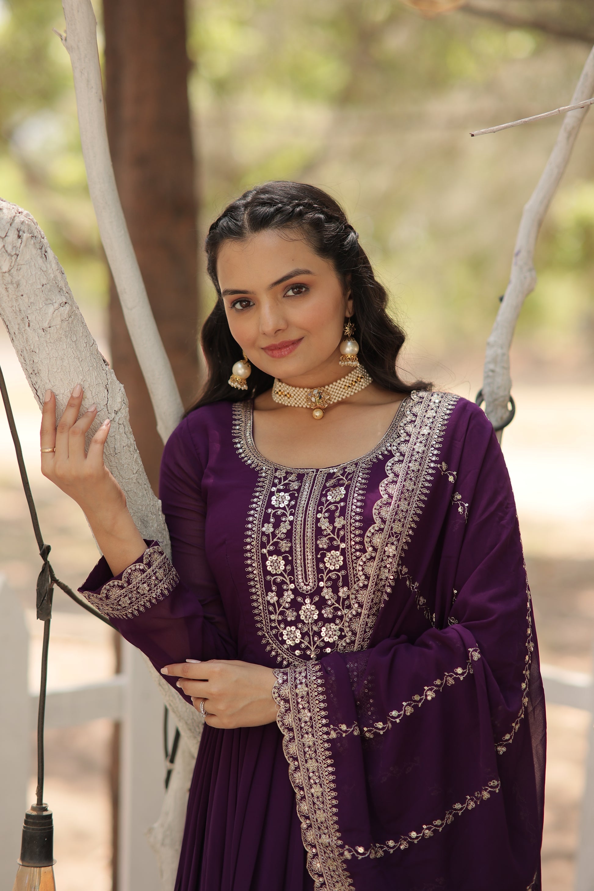 Vasundhara purple faux blooming Anarkali gown suit set