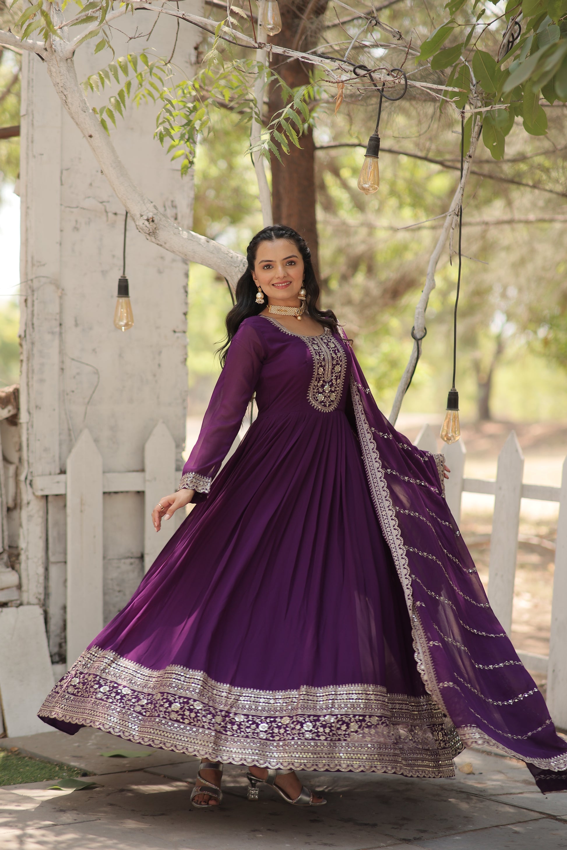 Vasundhara purple faux blooming Anarkali gown suit set