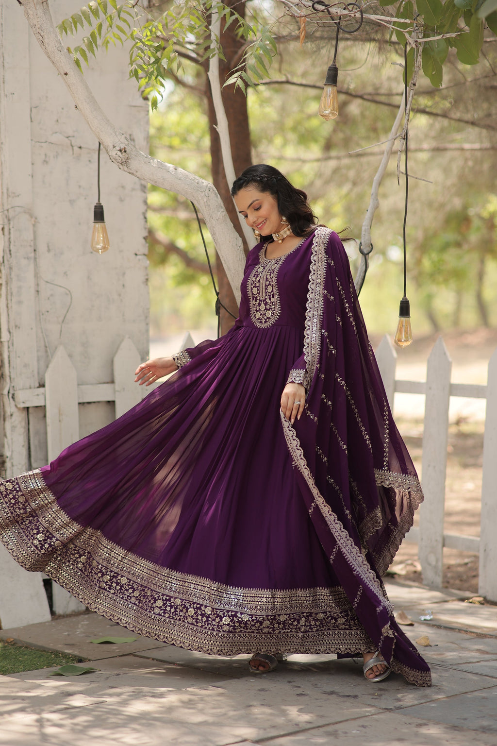 Vasundhara purple faux blooming Anarkali gown suit set