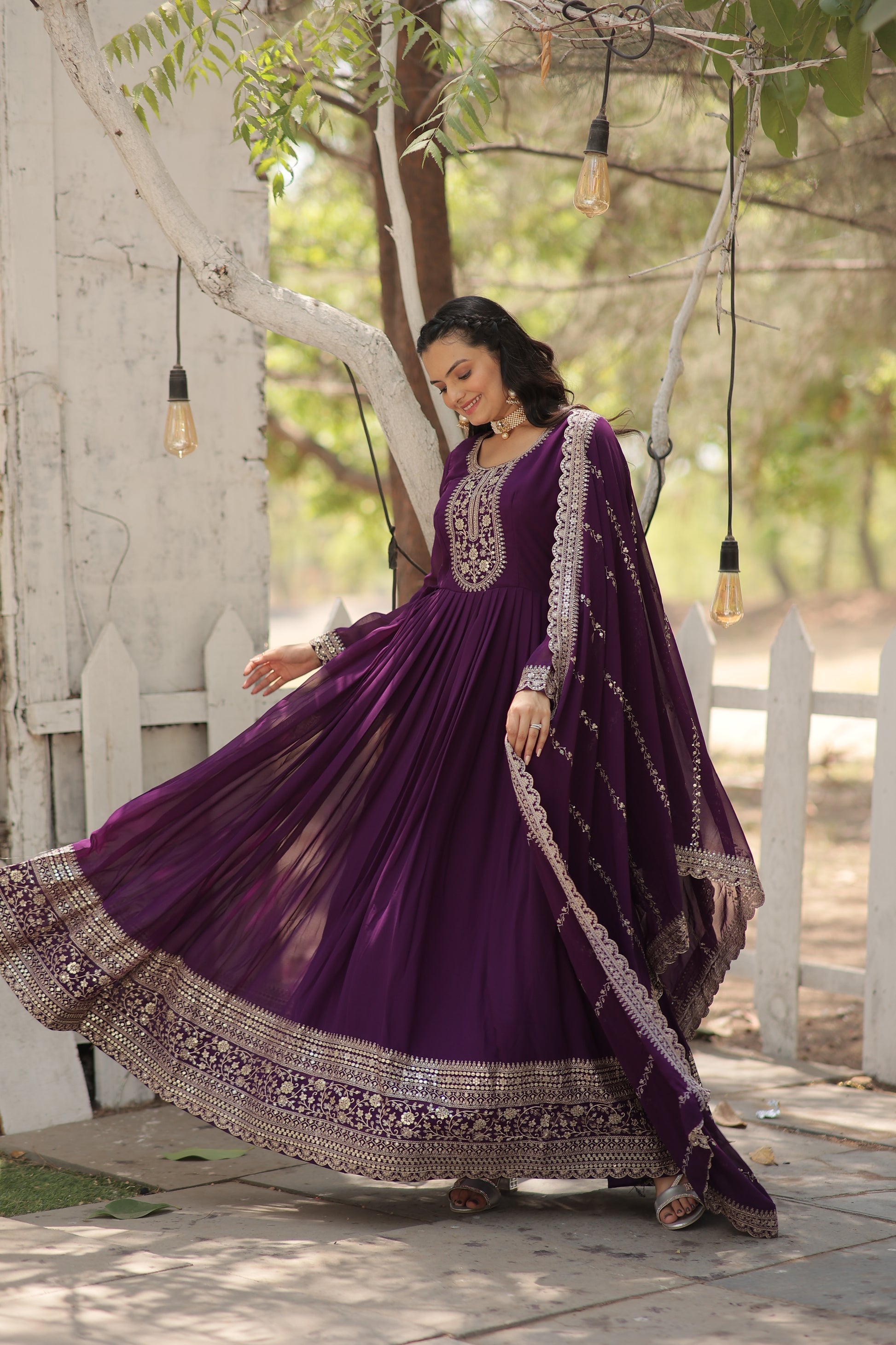 Vasundhara purple faux blooming Anarkali gown suit set
