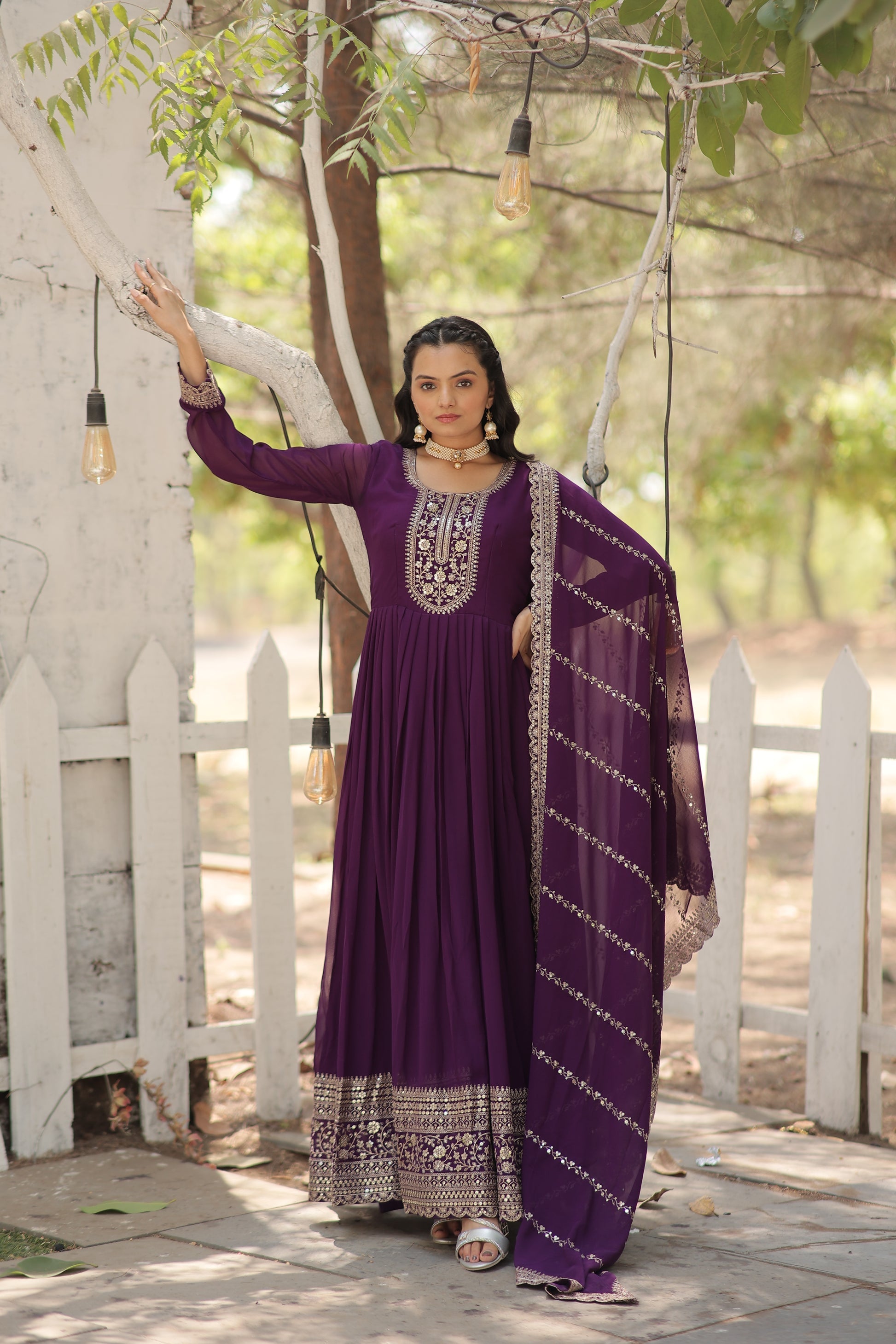 Vasundhara purple faux blooming Anarkali gown suit set