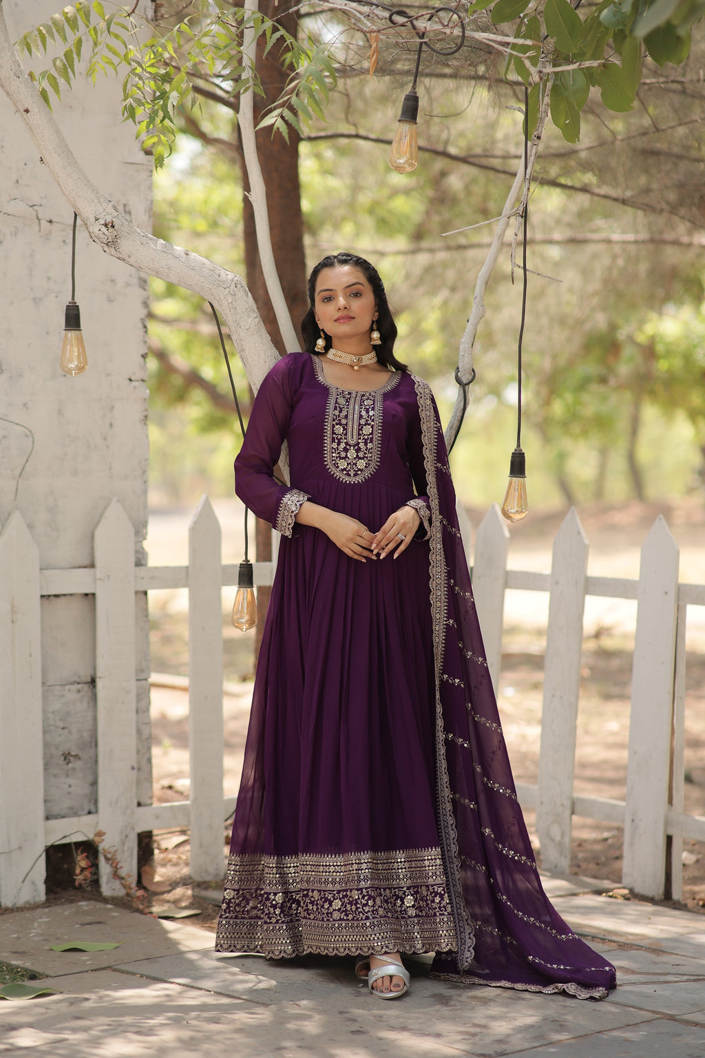 Vasundhara purple faux blooming Anarkali gown suit set