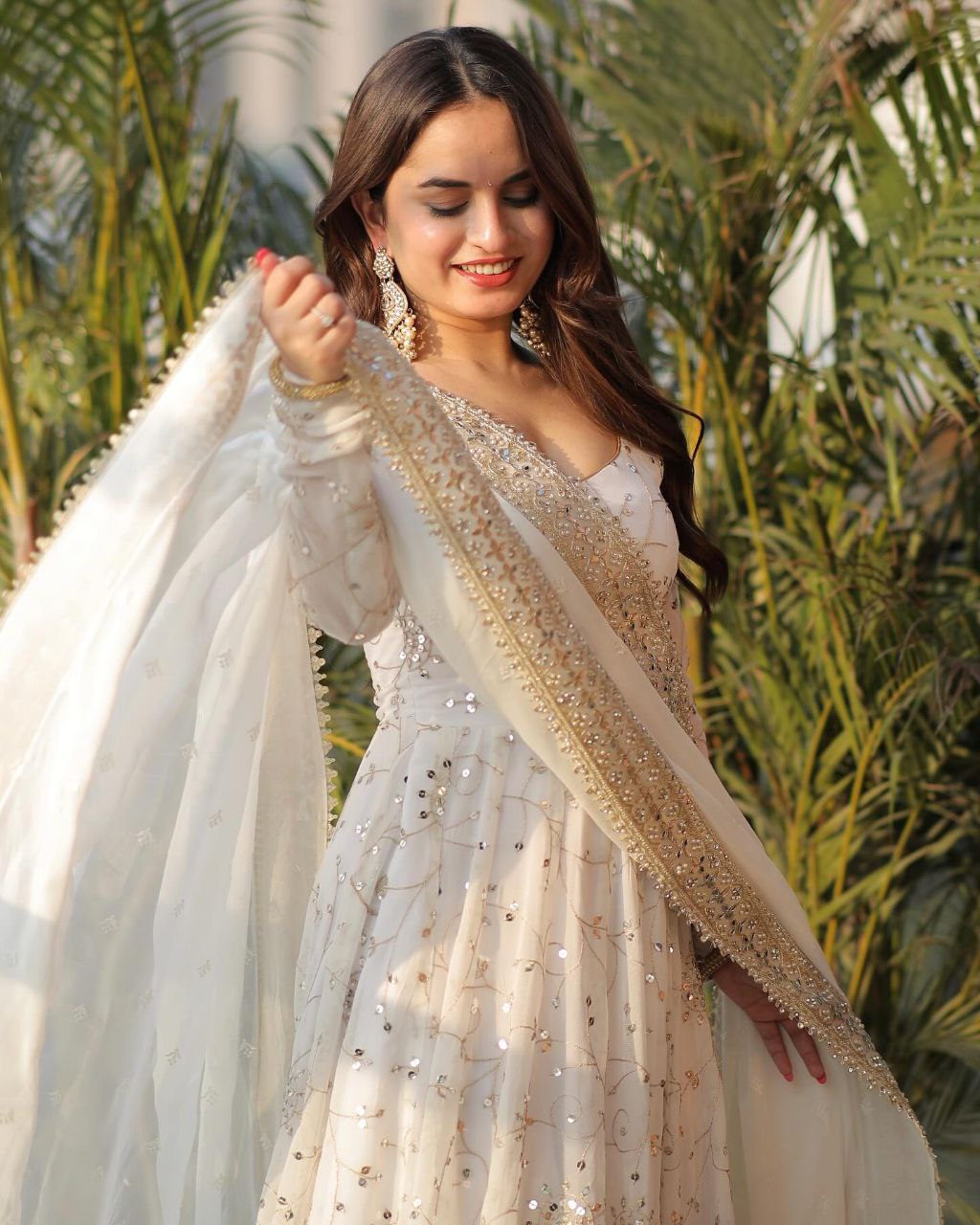 White princess anarkali suit set with golden embroidery