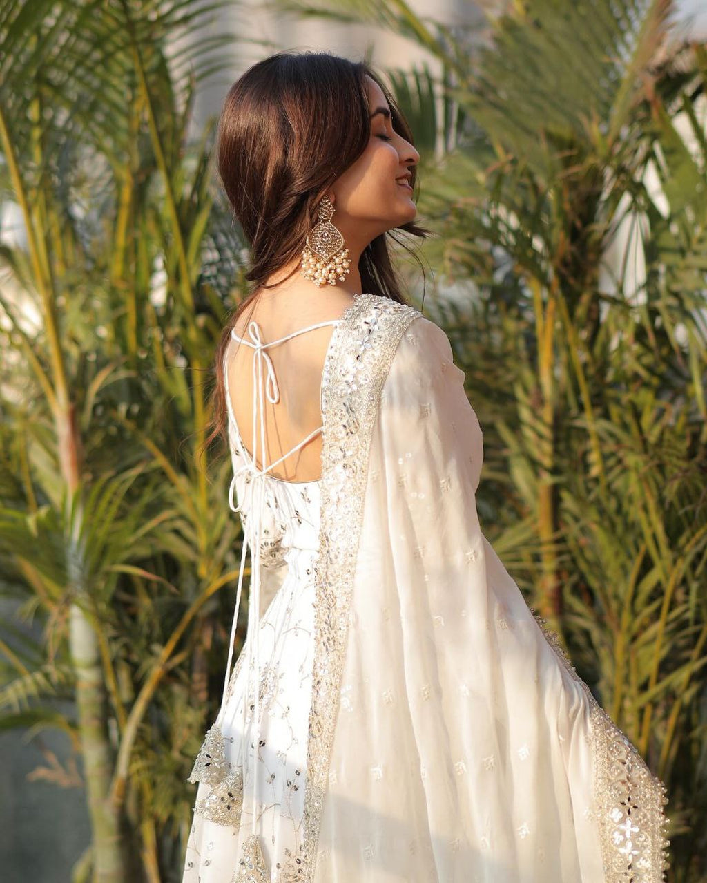 White princess anarkali suit set with golden embroidery