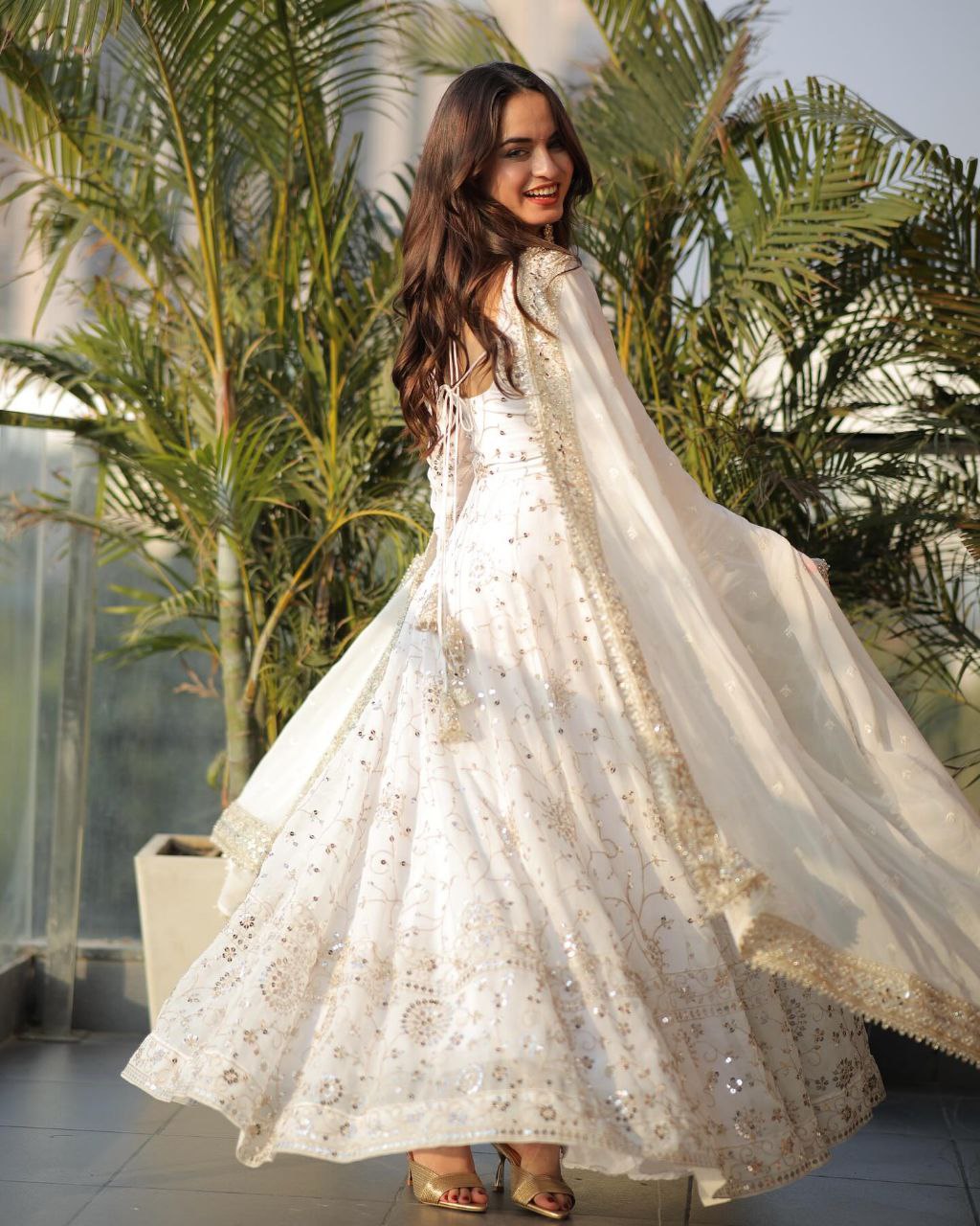 White princess anarkali suit set with golden embroidery