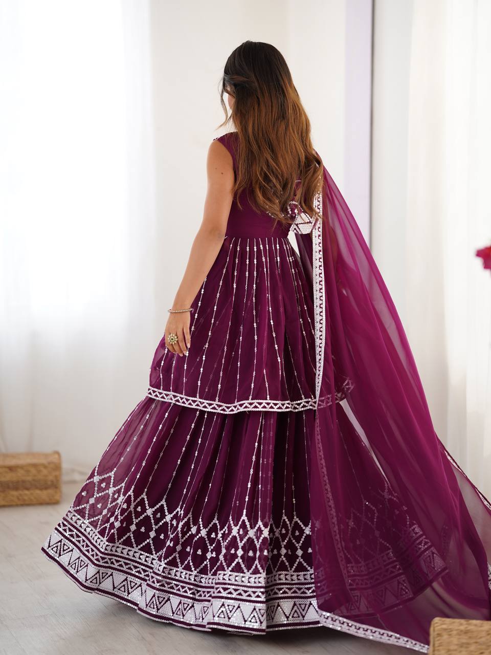 Wine coloured georgette sequin embroidered lehenga with top