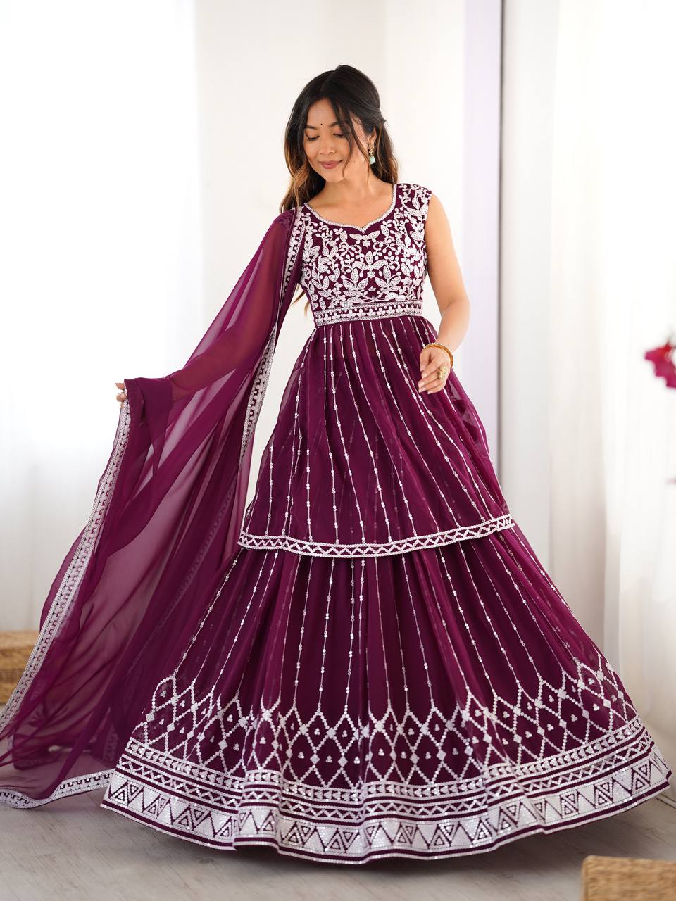 Wine coloured georgette sequin embroidered lehenga with top