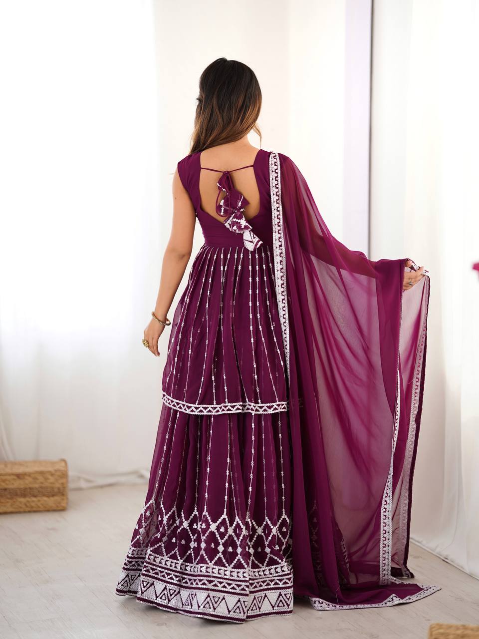 Wine coloured georgette sequin embroidered lehenga with top