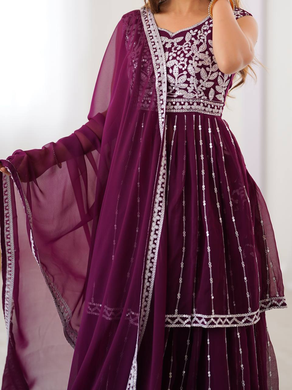 Wine coloured georgette sequin embroidered lehenga with top