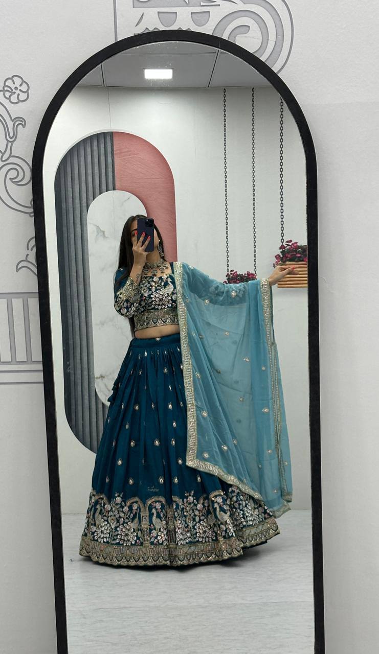 Anasuya teal blue vichitra silk embroidery work lehenga choli set