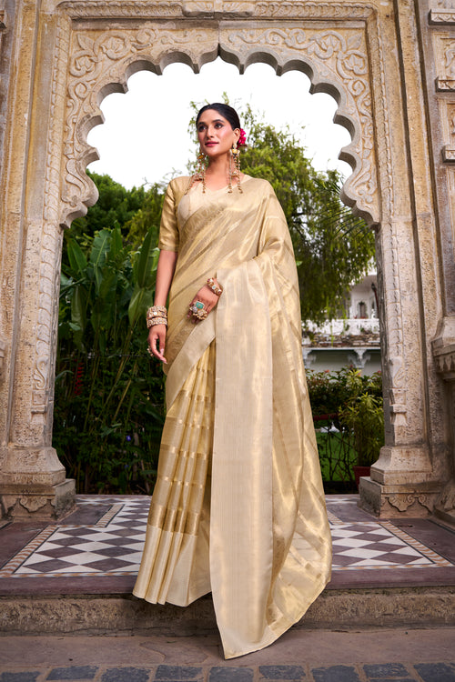 Cream gold tissue zari weaving saree with blouse