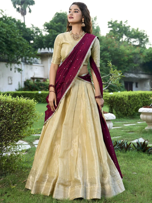 Cream kanchipuram silk lehenga choli with zari weaving and sequins embroidery