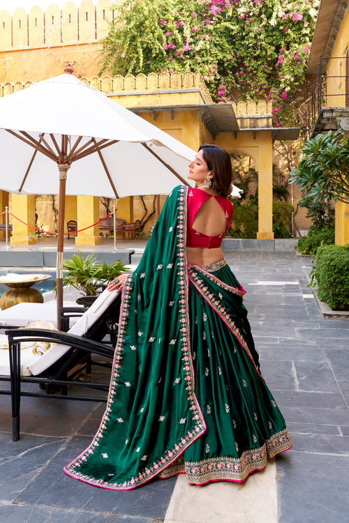 Damayanti green silk satin lehenga choli with sequins thread embroidery work