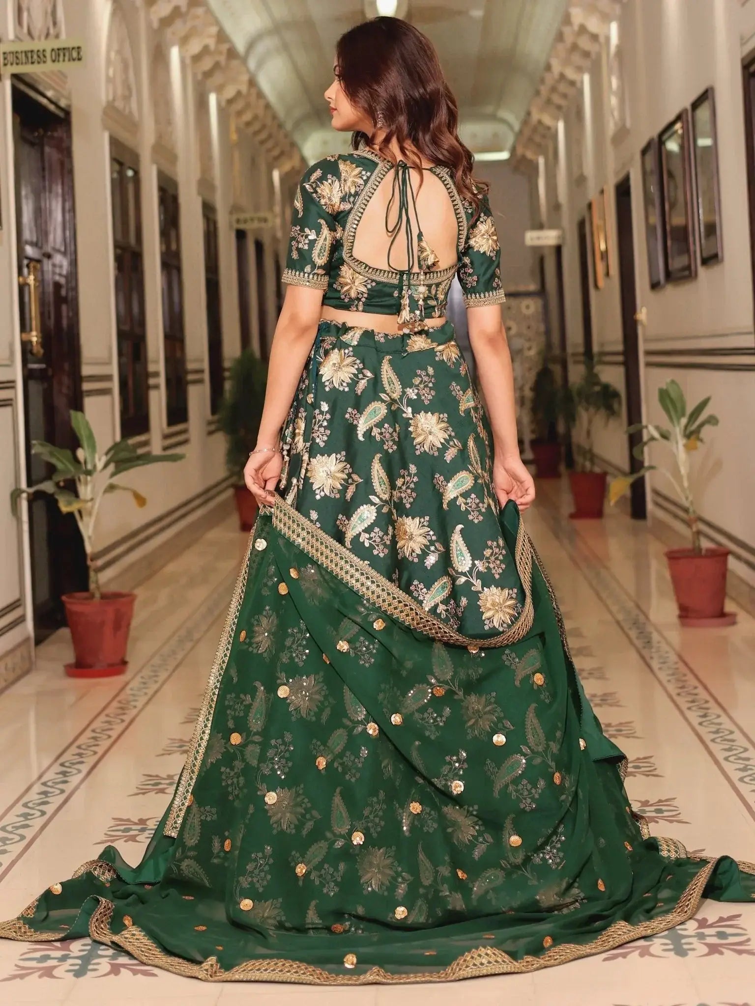 Dark green silk lehenga choli with thread zari dori sequins work