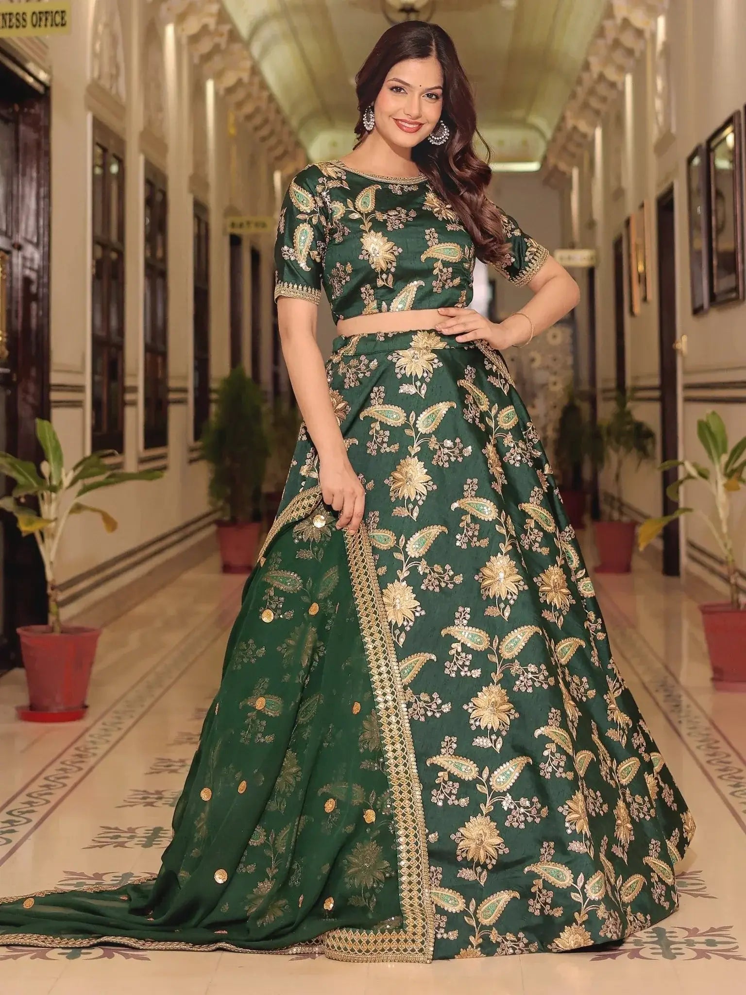 Dark green silk lehenga choli with thread zari dori sequins work