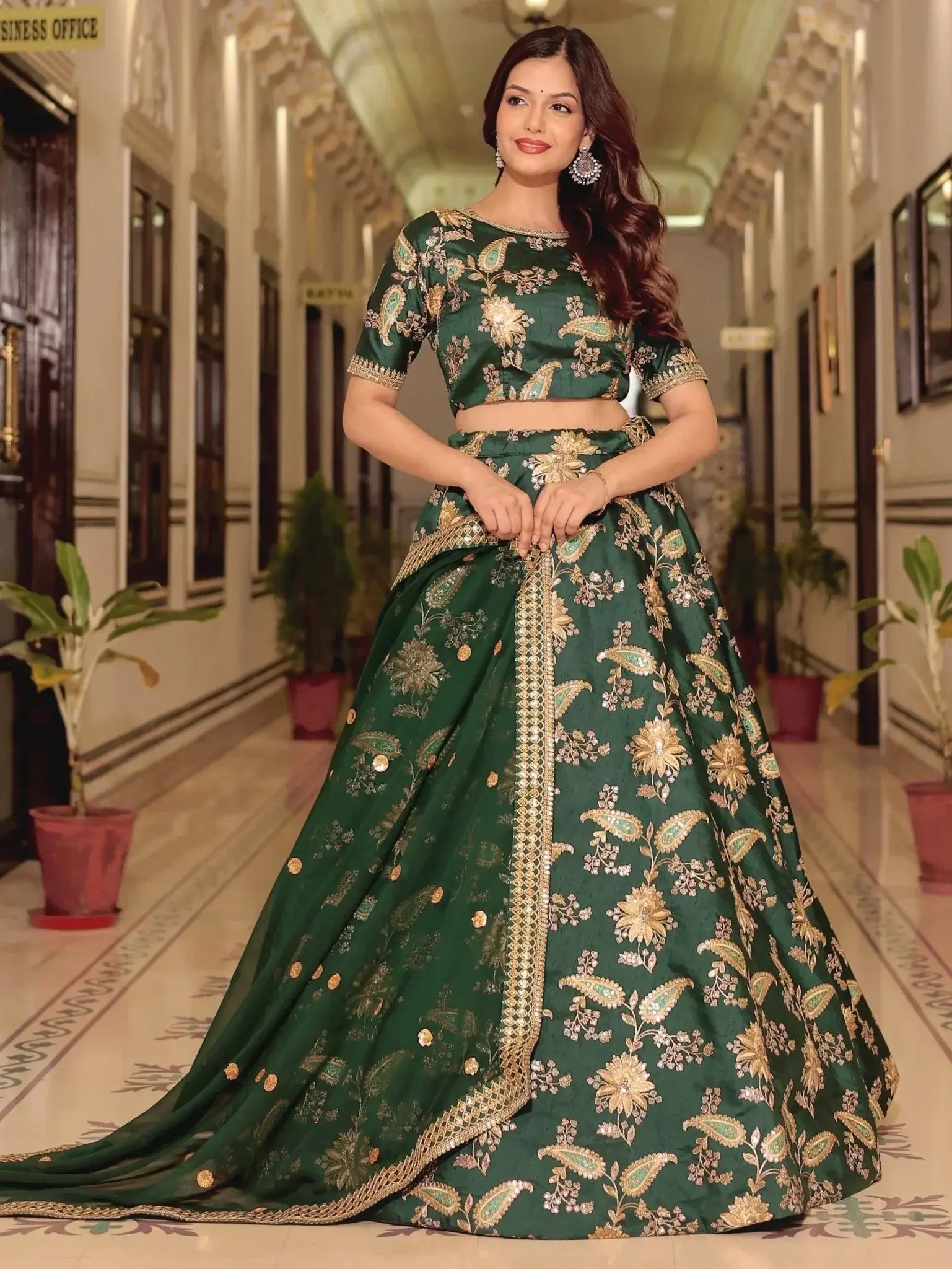 Dark green silk lehenga choli with thread zari dori sequins work