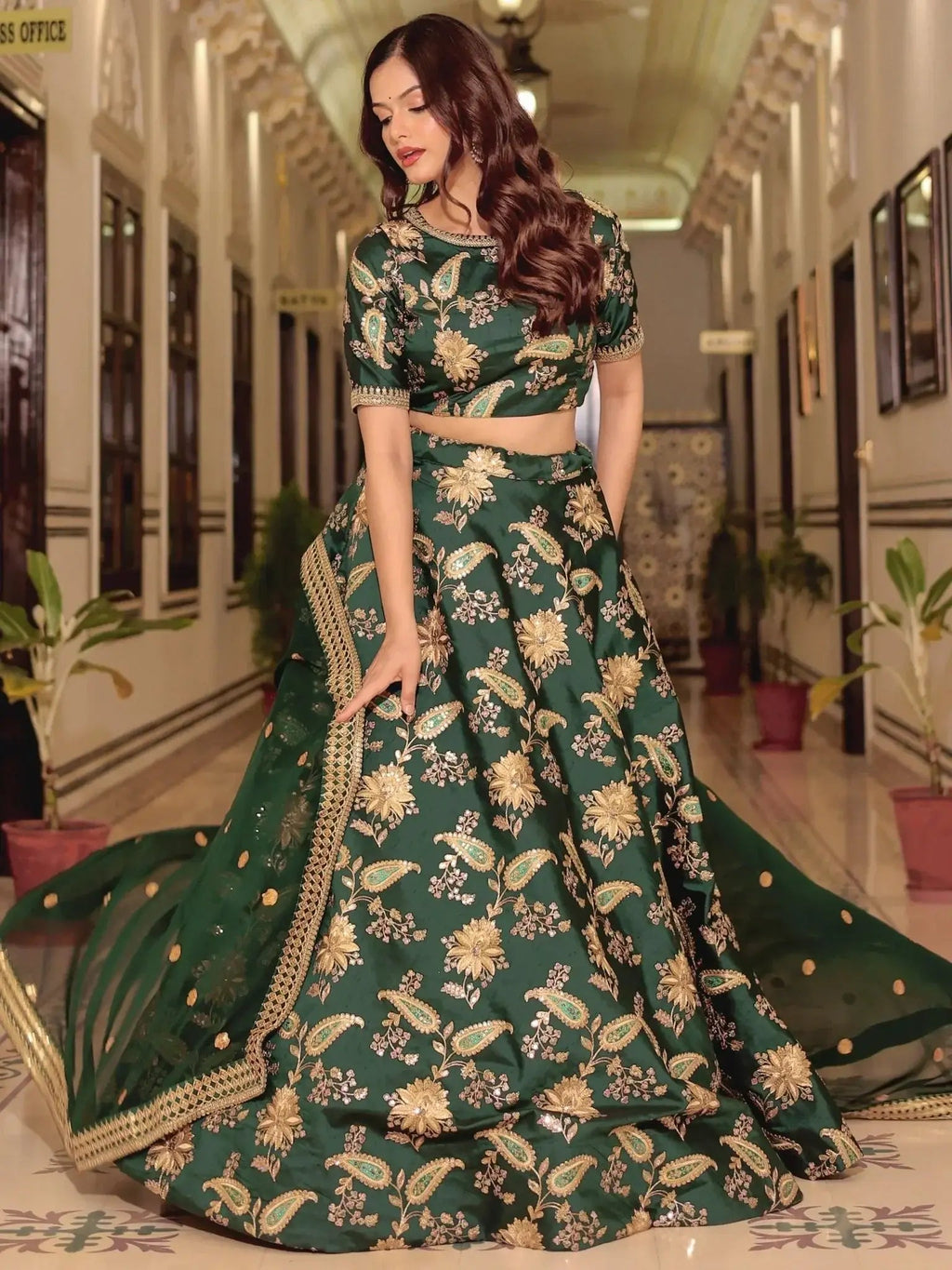 Dark green silk lehenga choli with thread zari dori sequins work