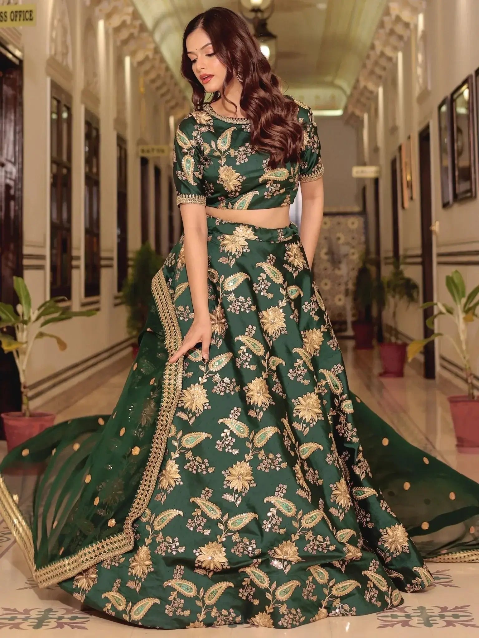 Dark green silk lehenga choli with thread zari dori sequins work