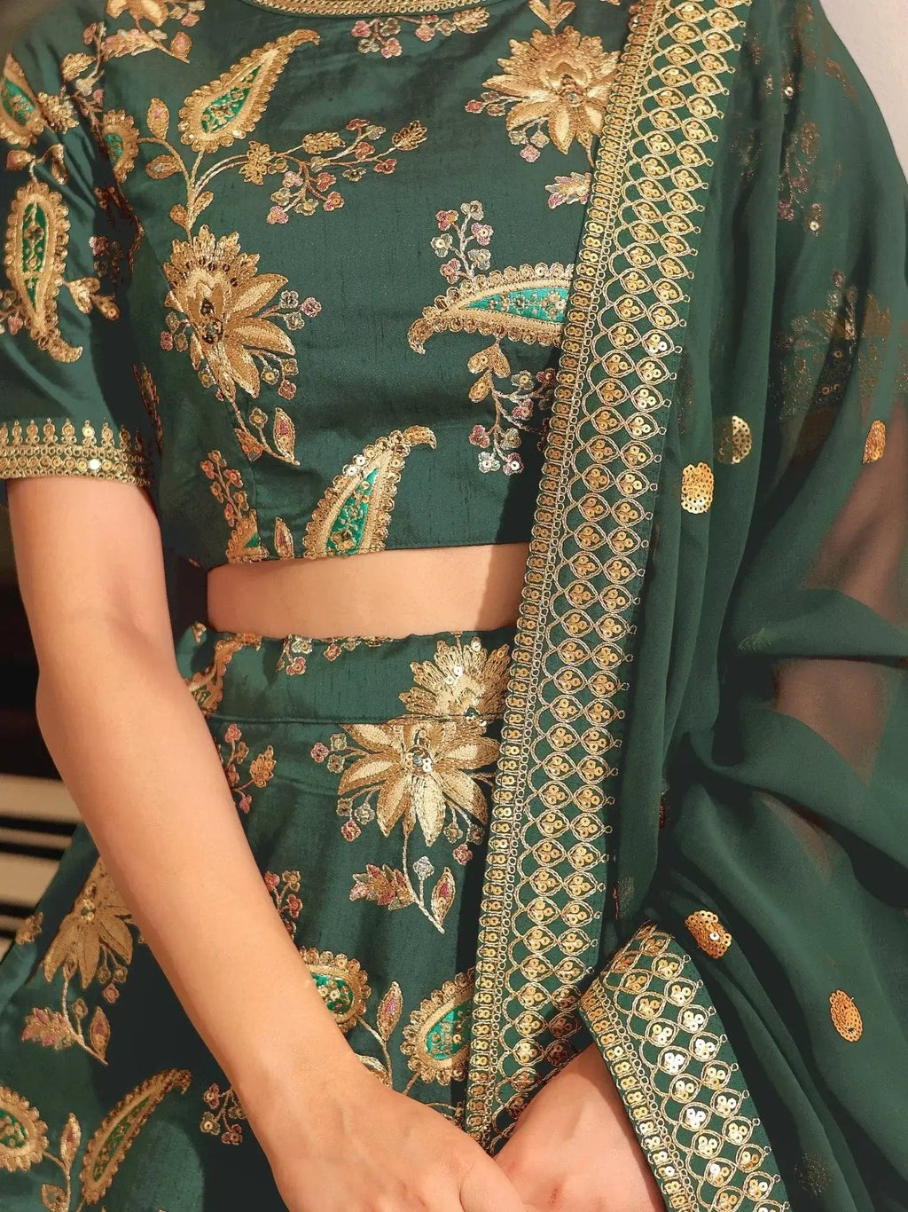 Dark green silk lehenga choli with thread zari dori sequins work