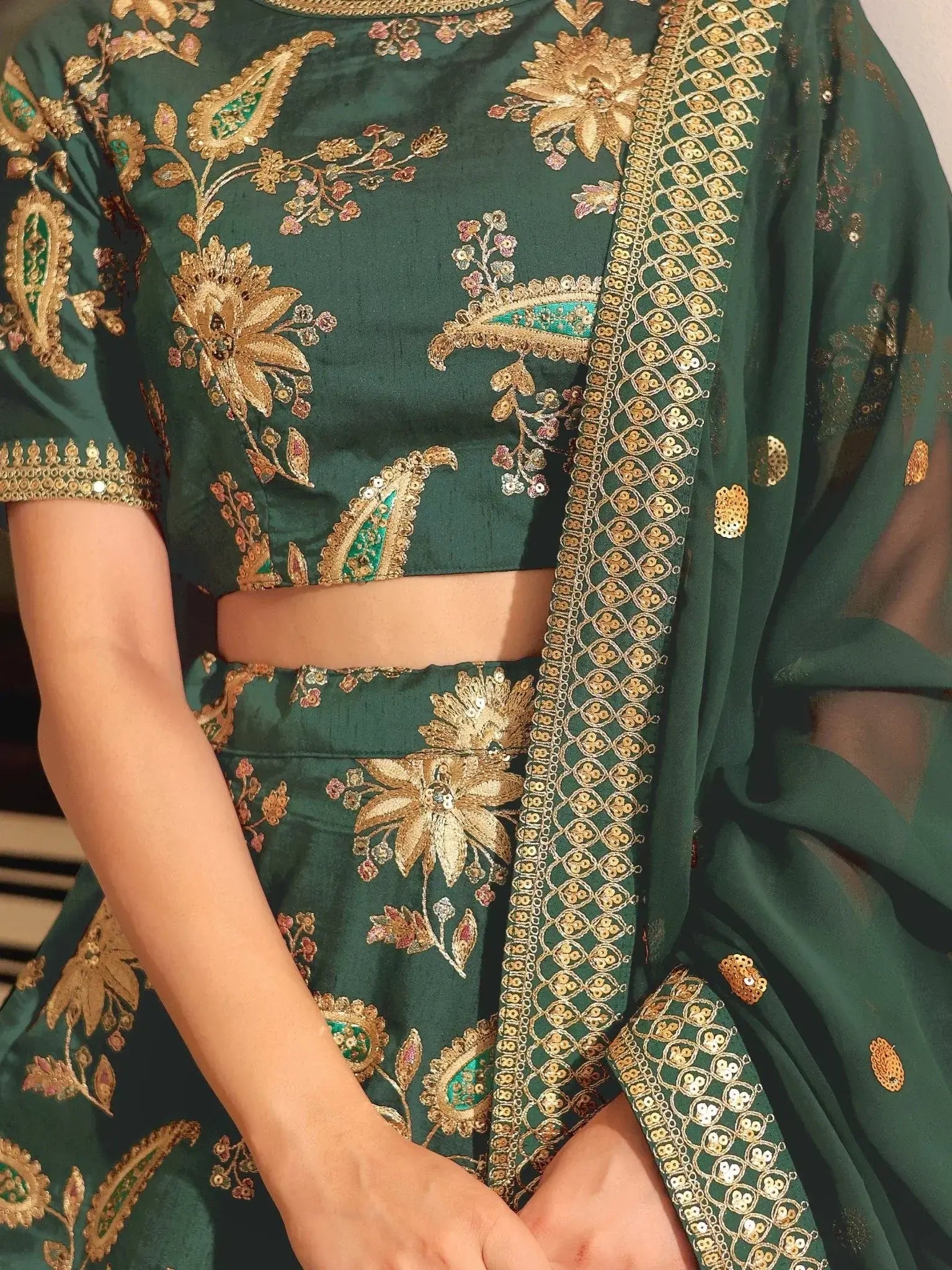 Dark green silk lehenga choli with thread zari dori sequins work