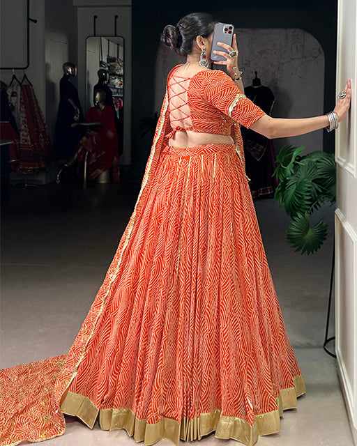 Orange soft georgette Bandhej print lehenga choli with dupatta