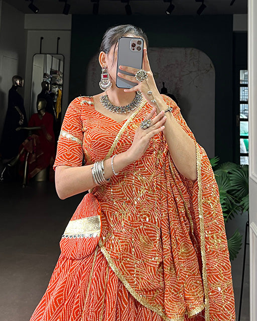 Orange soft georgette Bandhej print lehenga choli with dupatta