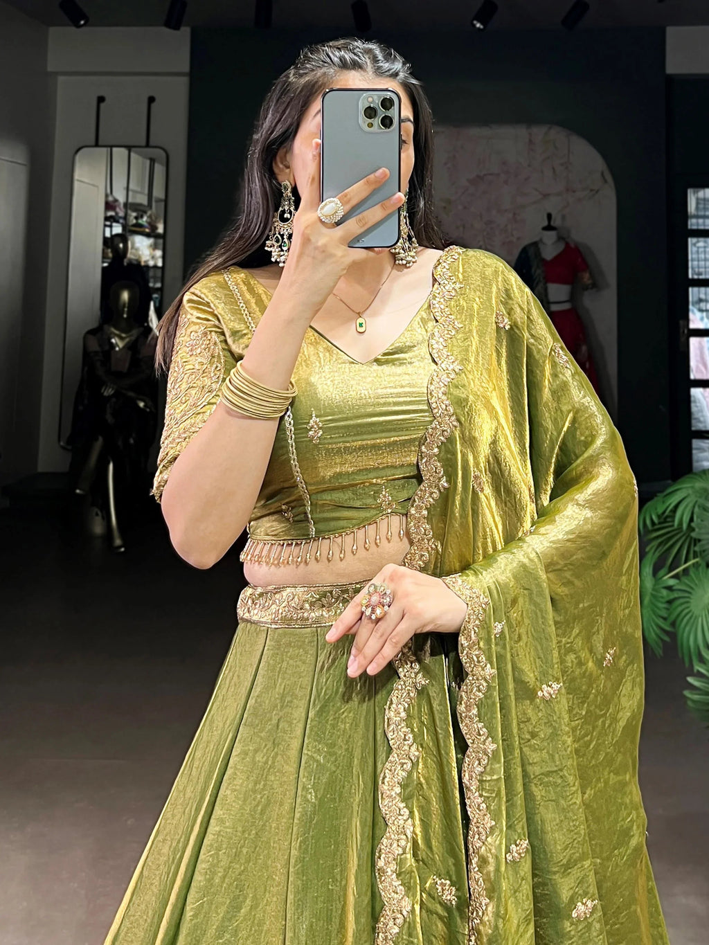 Green fendi embroidered lehenga choli with sequins thread work dupatta