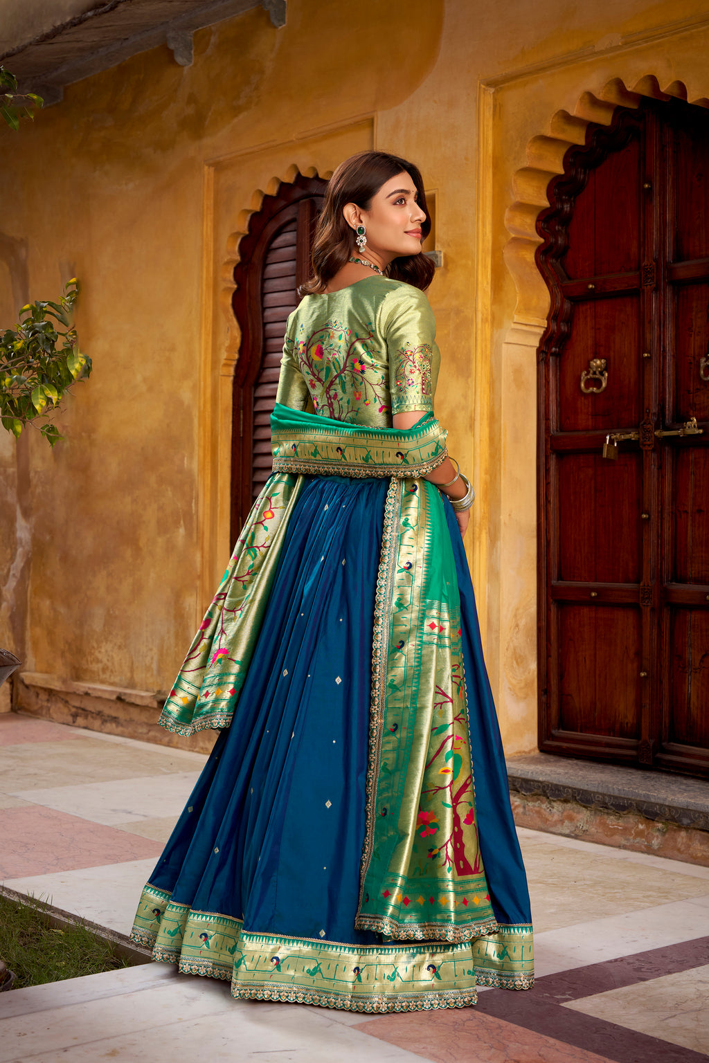 Hamsini navy blue soft silk Paithani lehenga choli with zari embroidered work