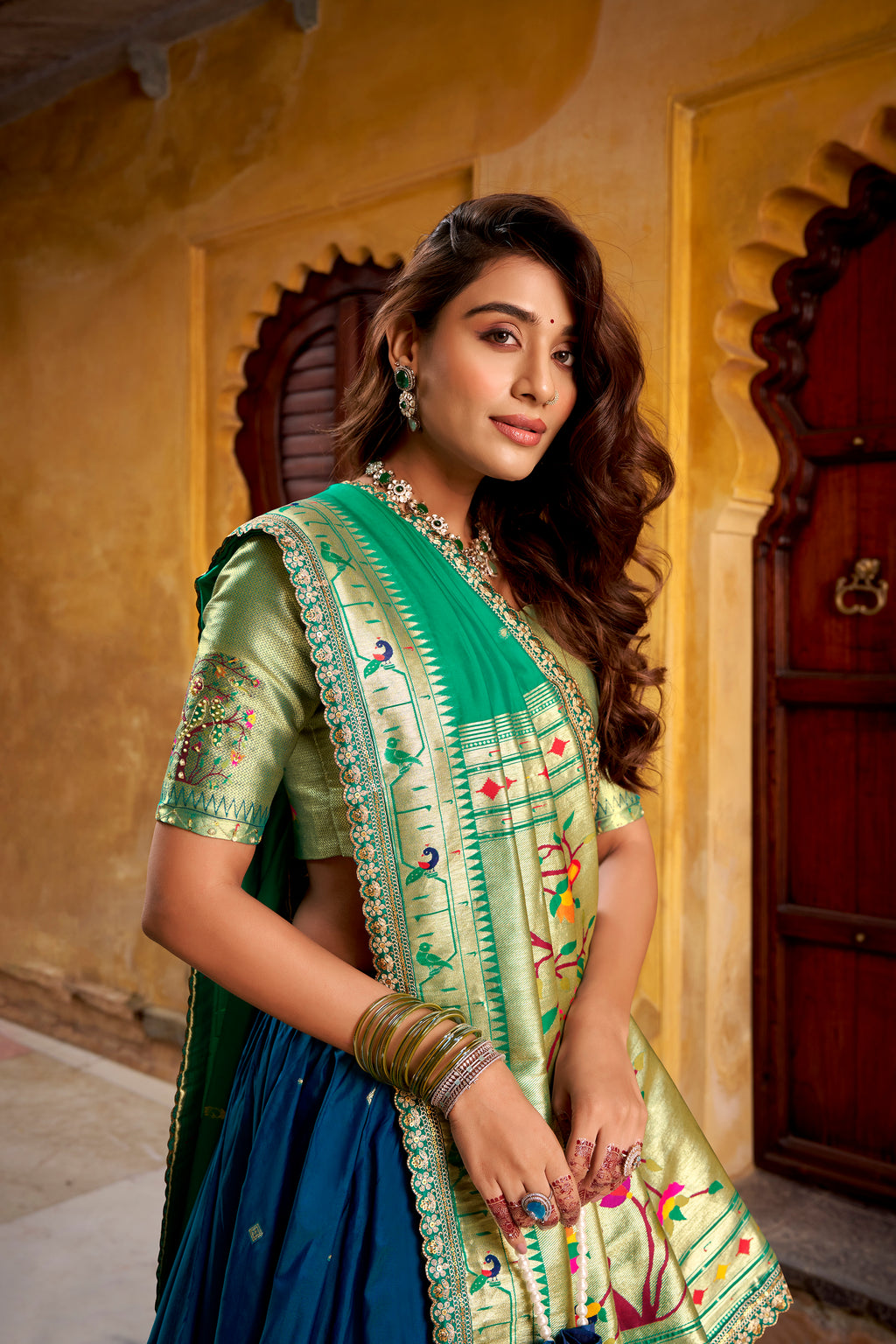 Hamsini navy blue soft silk Paithani lehenga choli with zari embroidered work