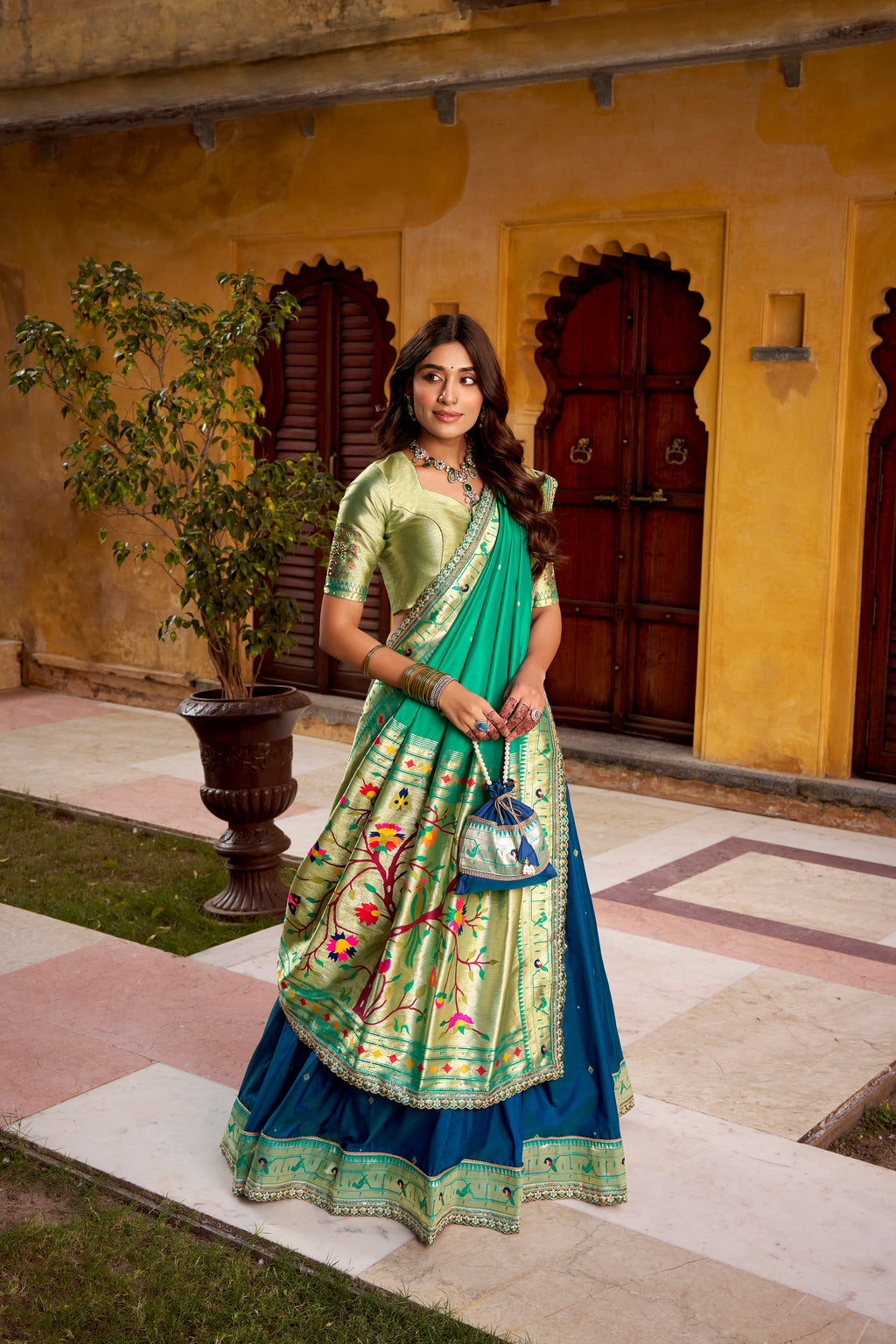 Hamsini navy blue soft silk Paithani lehenga choli with zari embroidered work
