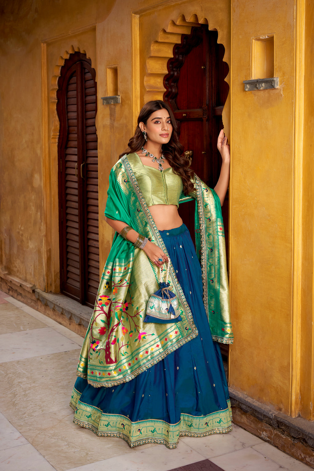 Hamsini navy blue soft silk Paithani lehenga choli with zari embroidered work