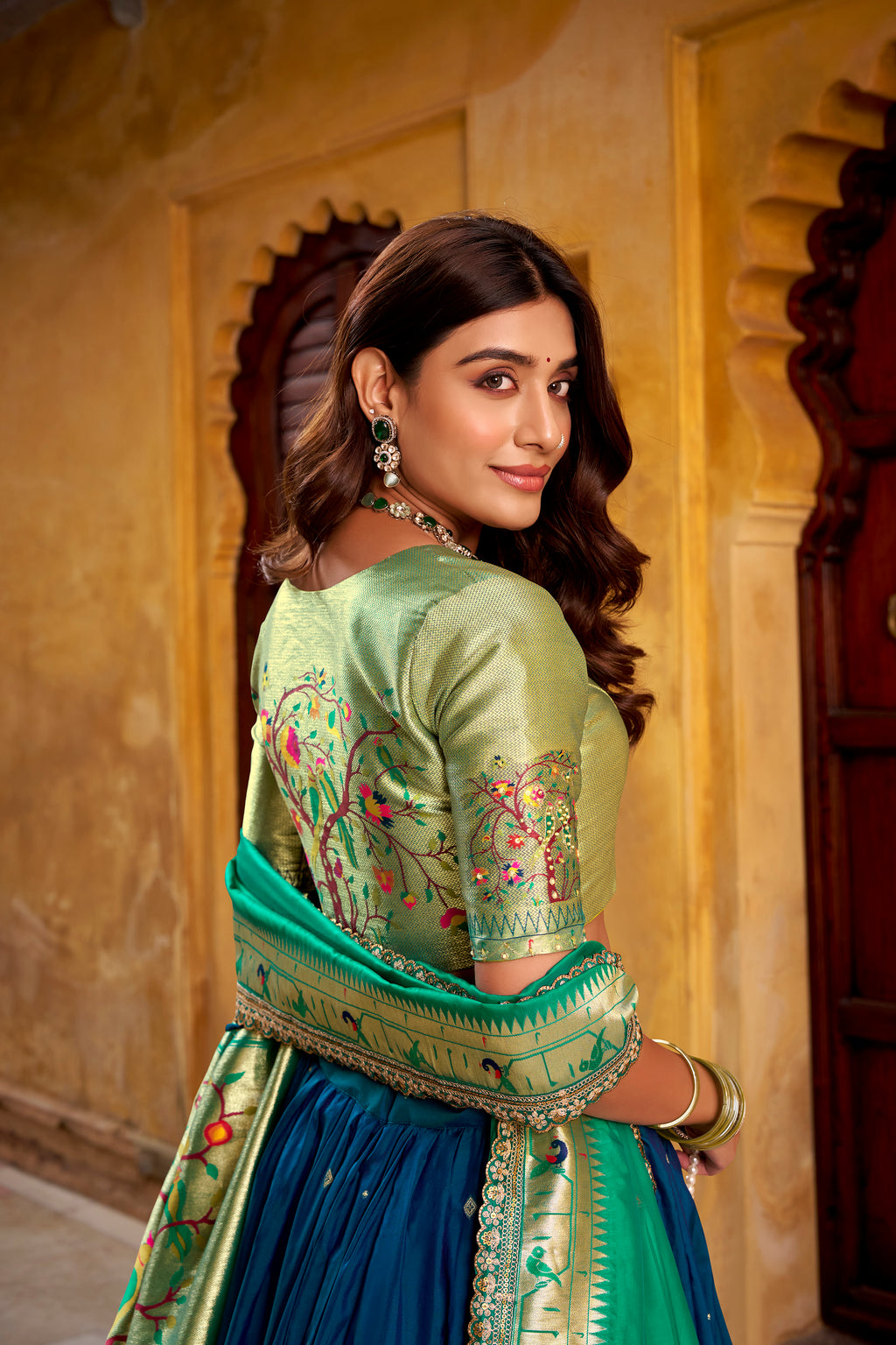 Hamsini navy blue soft silk Paithani lehenga choli with zari embroidered work