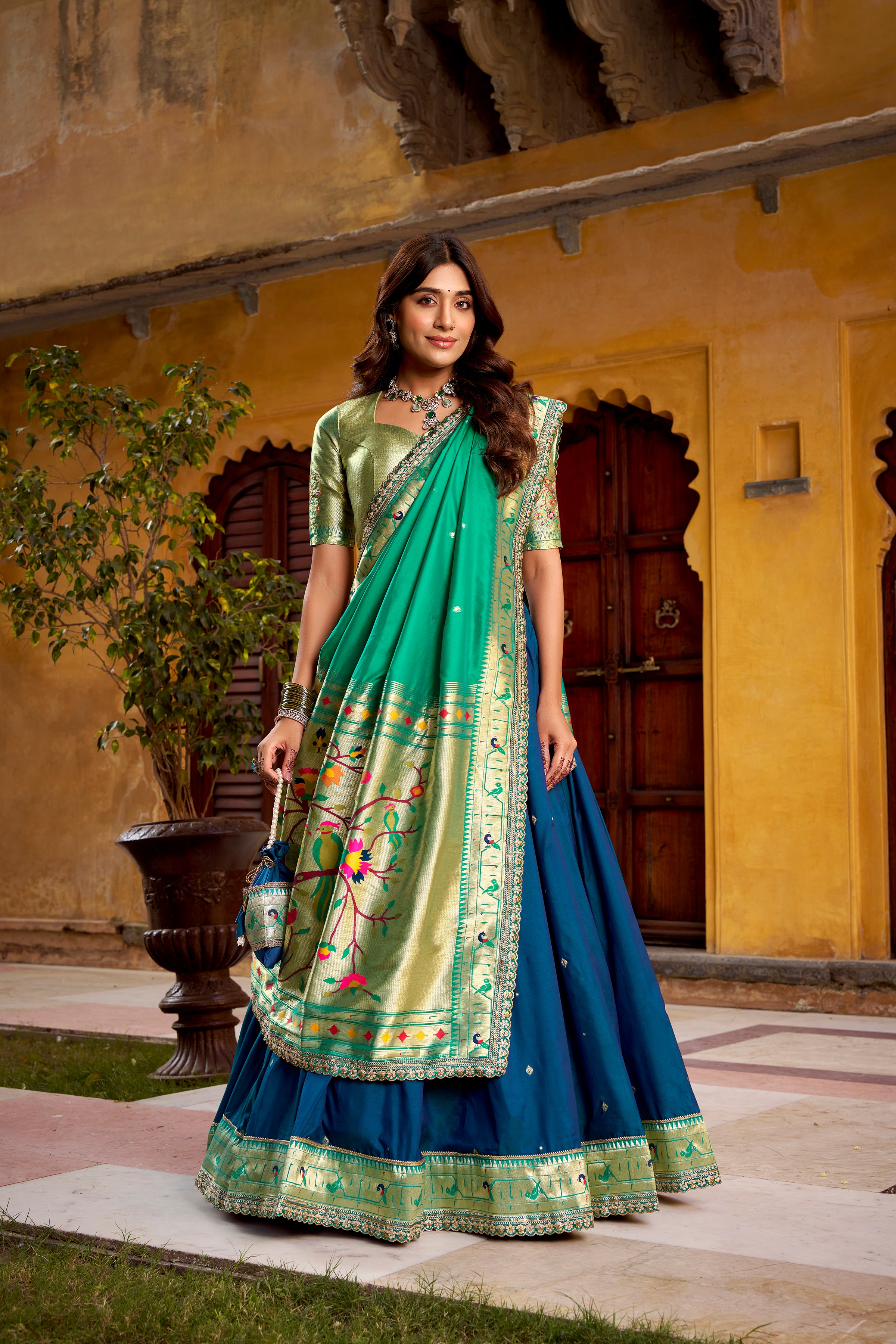 Hamsini Navy Blue Soft Silk with Zari Embroidered Work Paithani Lehenga Choli