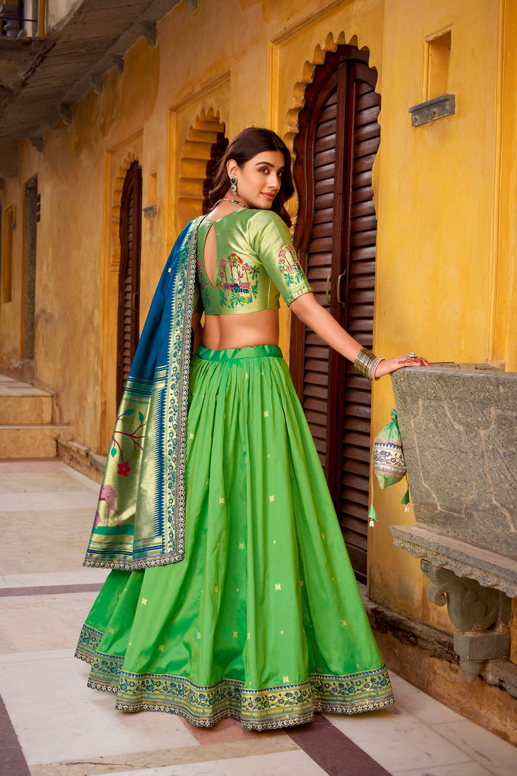 Hamsini Parrot Green Soft Silk with Zari Embroidered Work Paithani Lehenga Choli