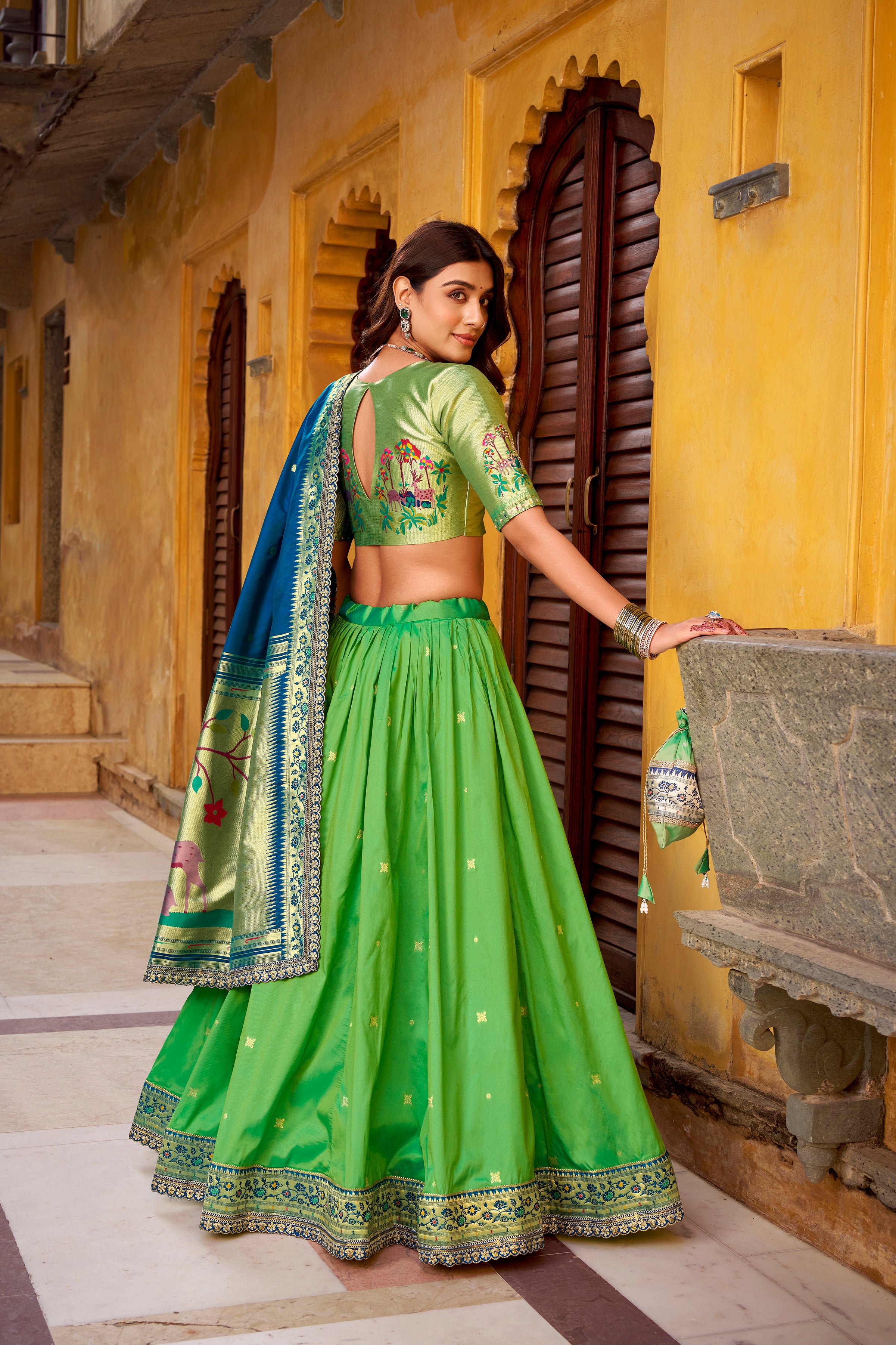 Hamsini Parrot Green Soft Silk with Zari Embroidered Work Paithani Lehenga Choli