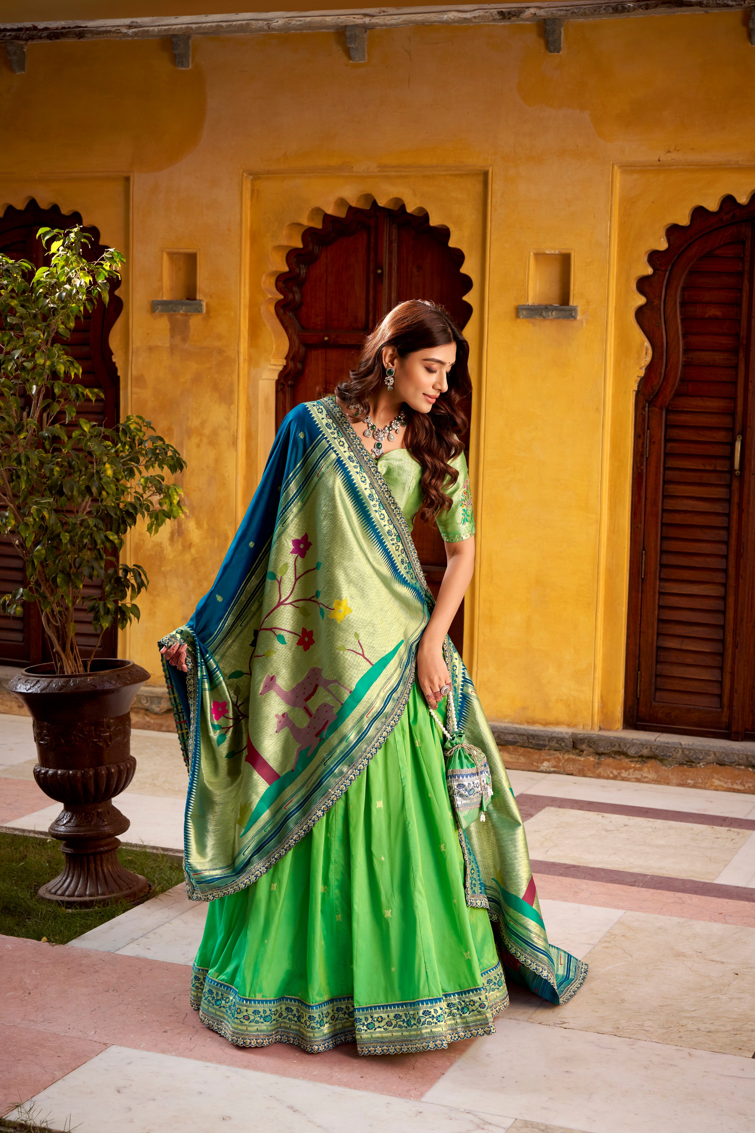 Hamsini Parrot Green Soft Silk with Zari Embroidered Work Paithani Lehenga Choli