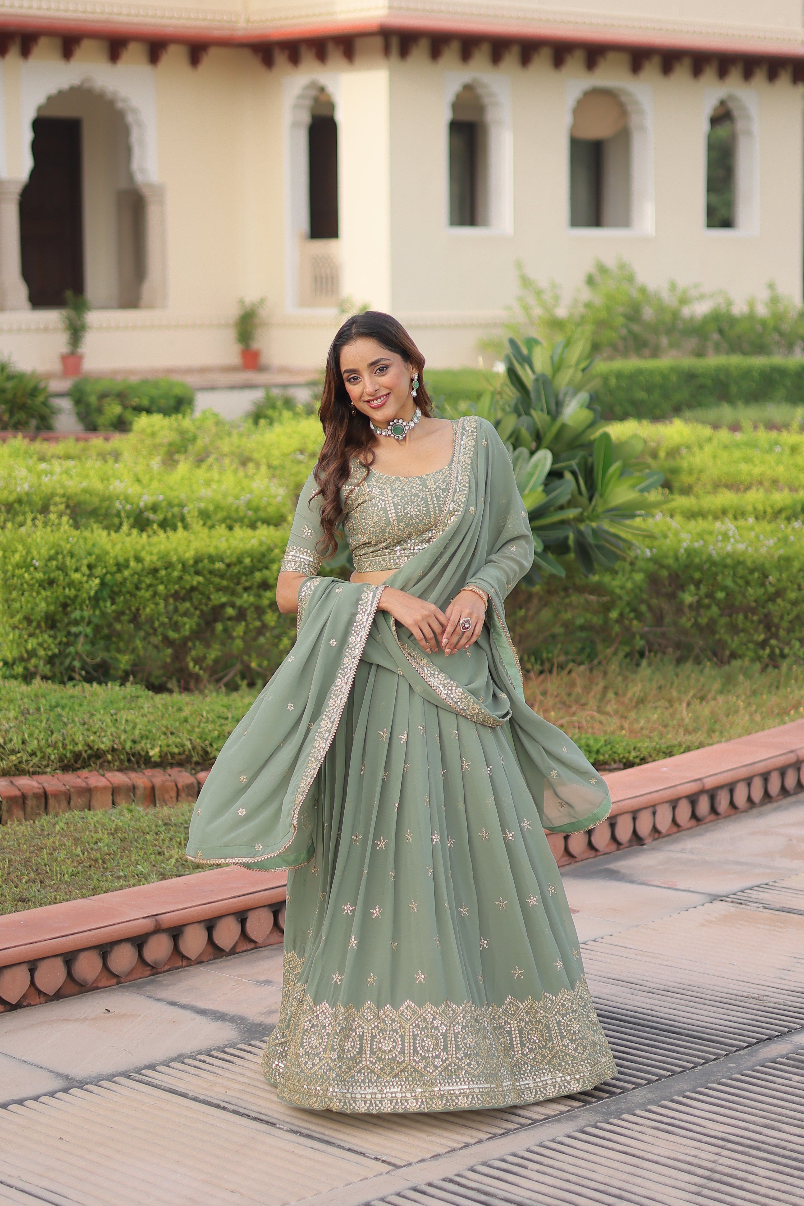 Invi Pista Green Faux Georgette Sequins Zari Embroidered Lehenga Choli