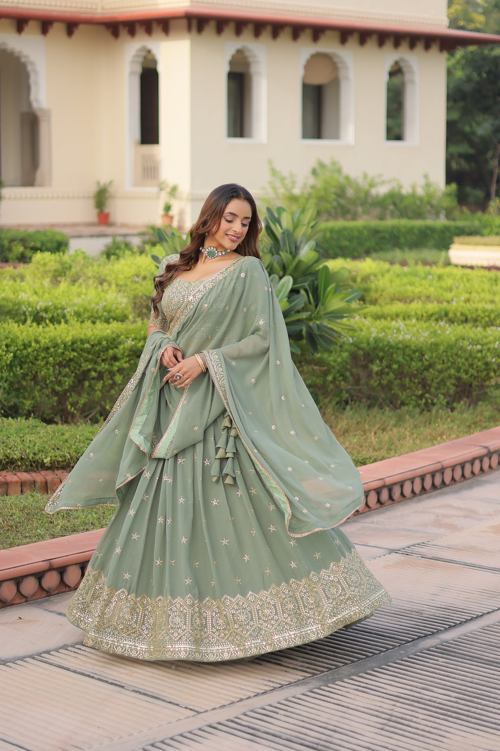 Invi Pista Green Faux Georgette Sequins Zari Embroidered Lehenga Choli