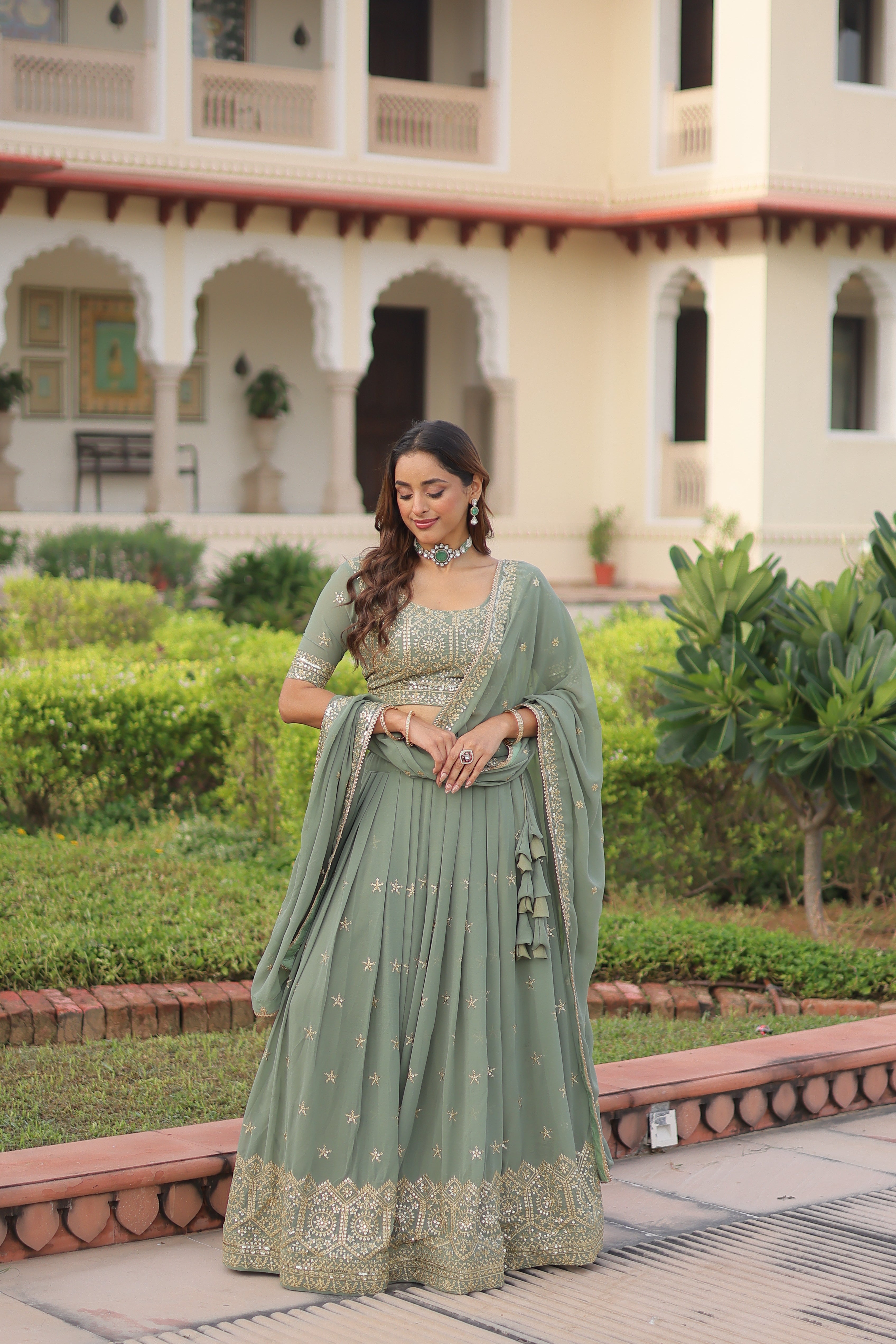 Invi Pista Green Faux Georgette Sequins Zari Embroidered Lehenga Choli