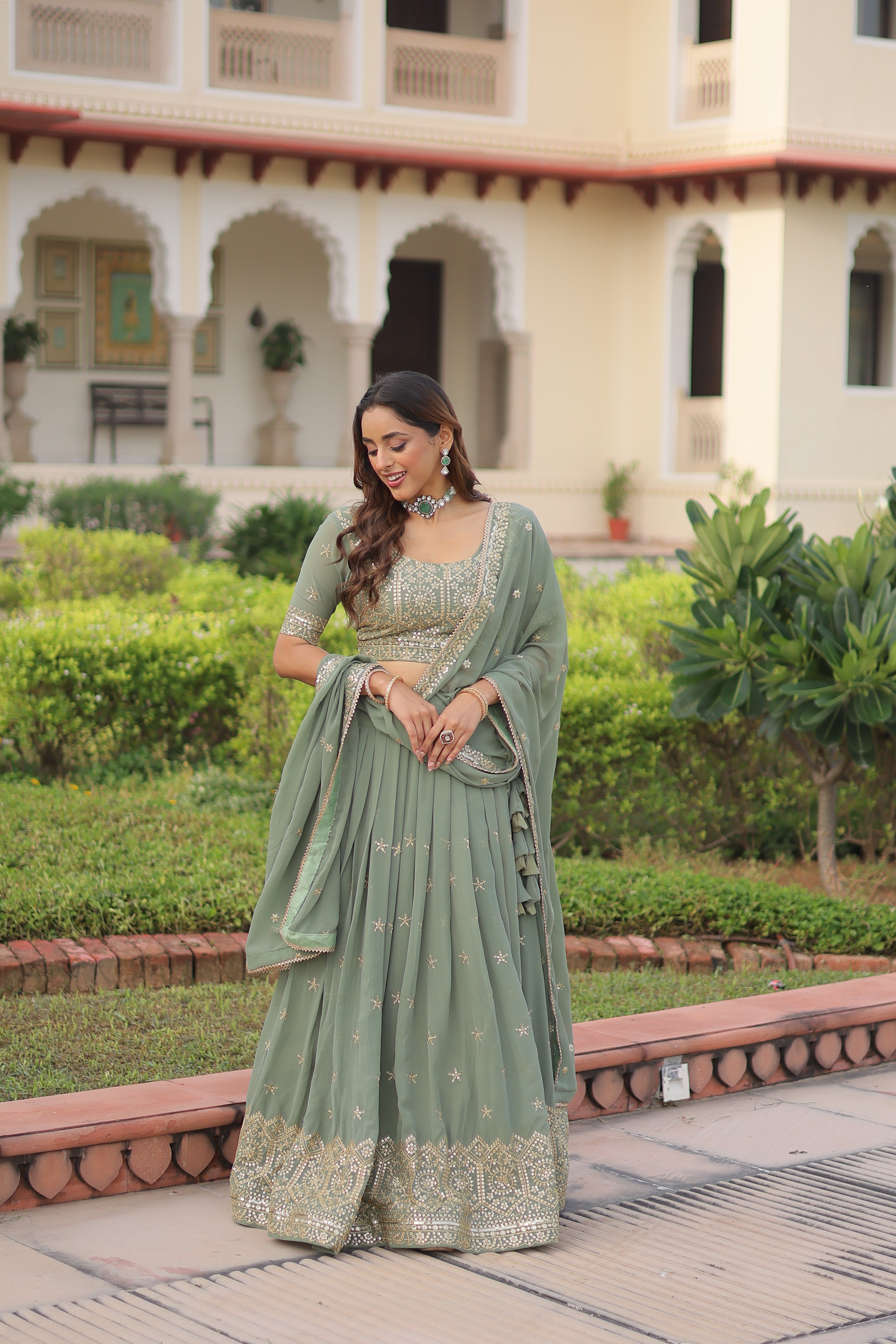 Invi Pista Green Faux Georgette Sequins Zari Embroidered Lehenga Choli