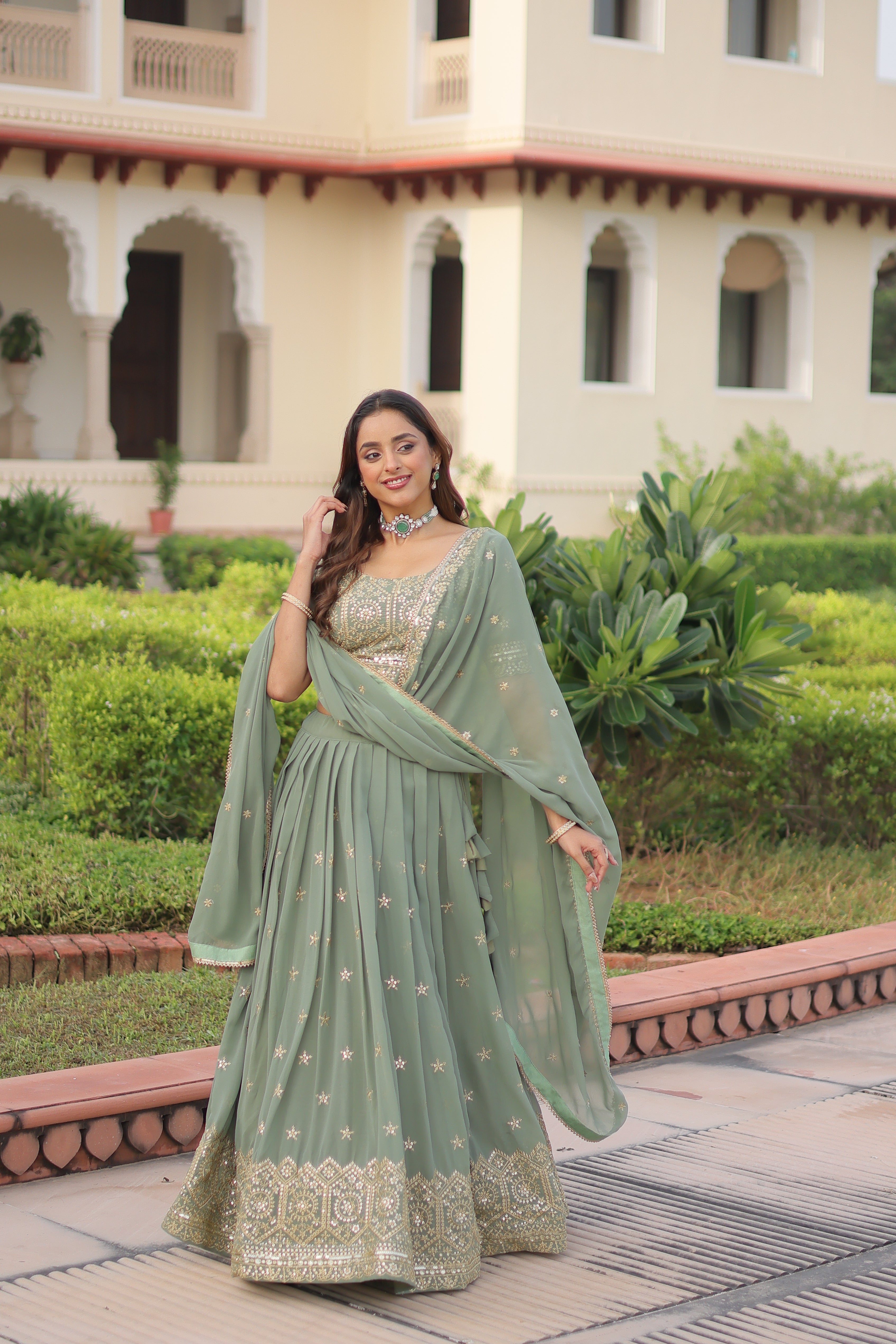 Invi Pista Green Faux Georgette Sequins Zari Embroidered Lehenga Choli