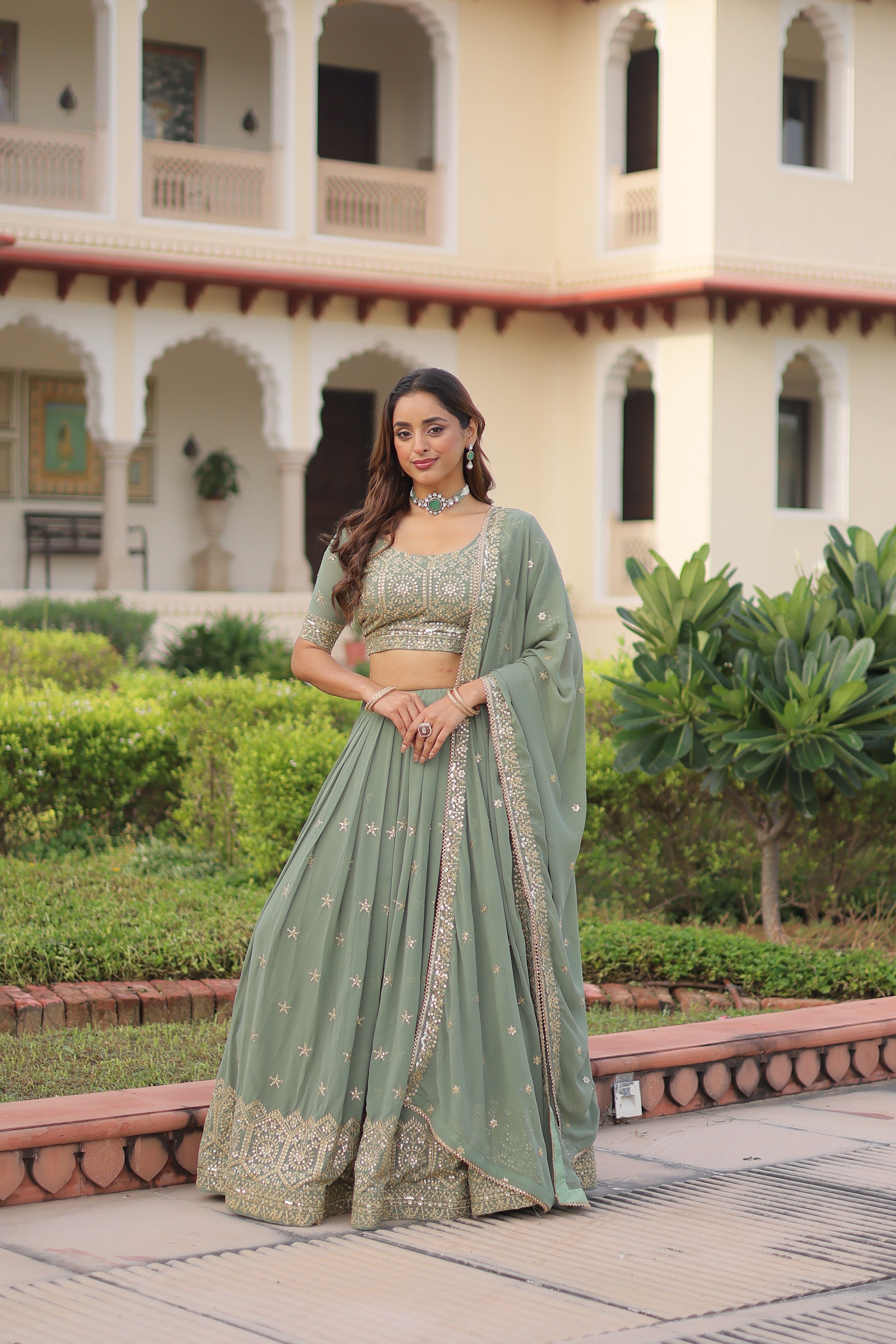Invi Pista Green Faux Georgette Sequins Zari Embroidered Lehenga Choli
