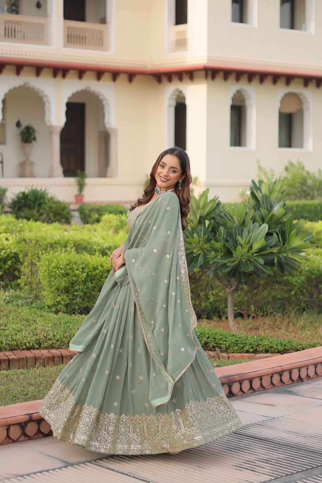 Invi Pista Green Faux Georgette Sequins Zari Embroidered Lehenga Choli