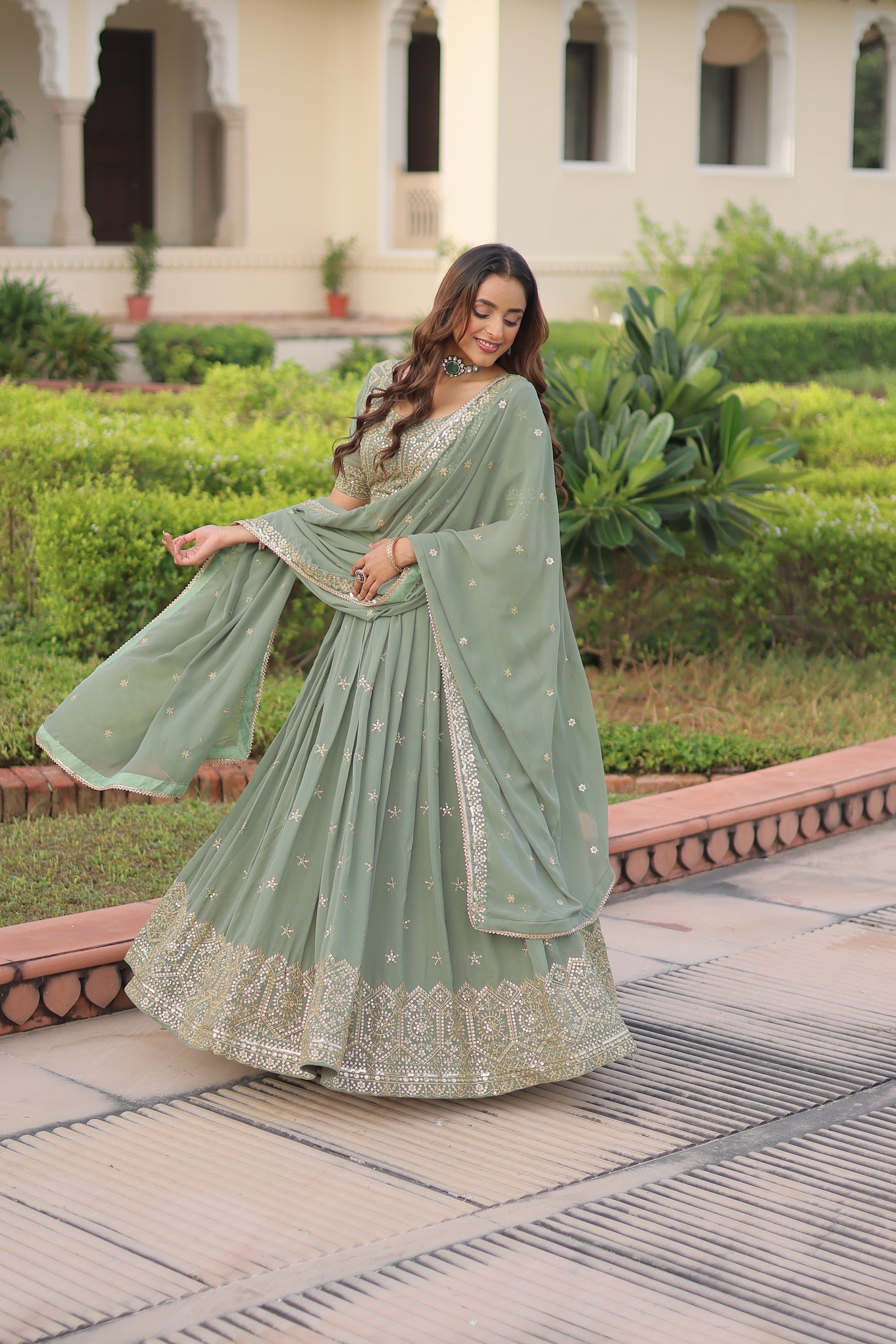 Invi Pista Green Faux Georgette Sequins Zari Embroidered Lehenga Choli