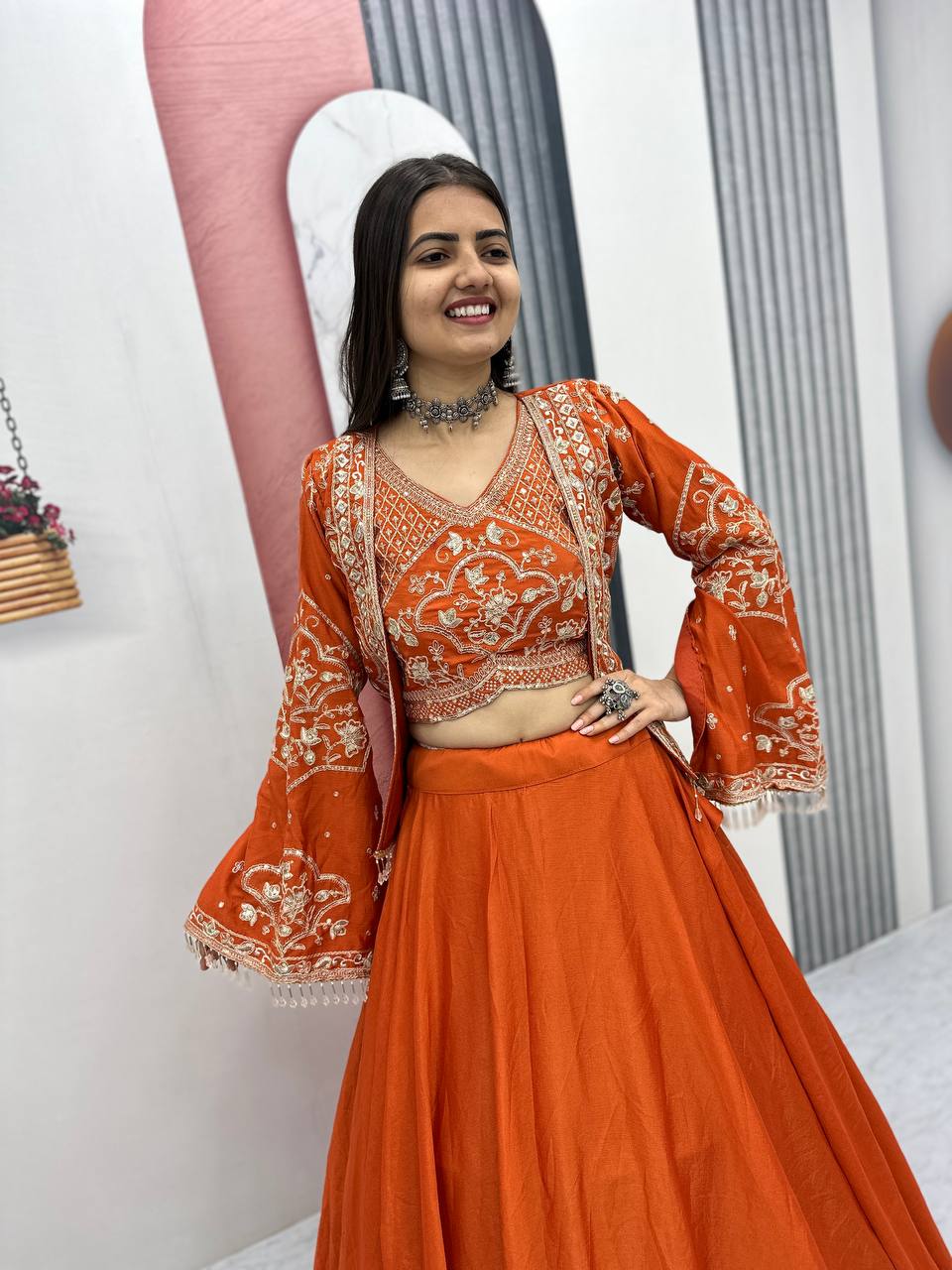 Keyara orange chinon embroidery work lehenga choli set with jacket