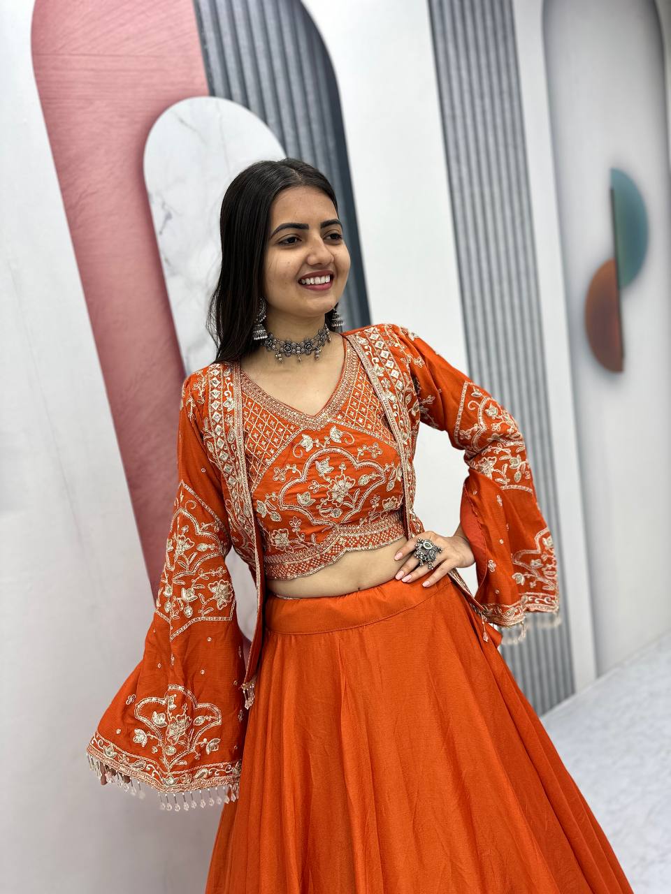 Keyara orange chinon embroidery work lehenga choli set with jacket