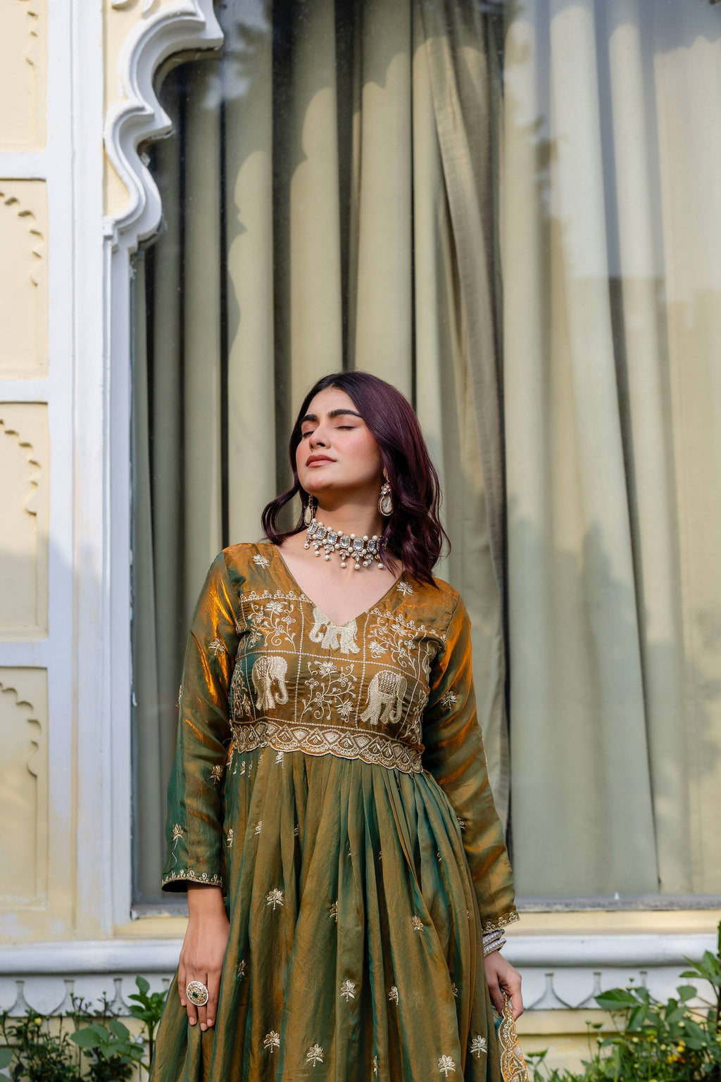 Krishnaveni olive green fendy satin embroidered gown with dupatta