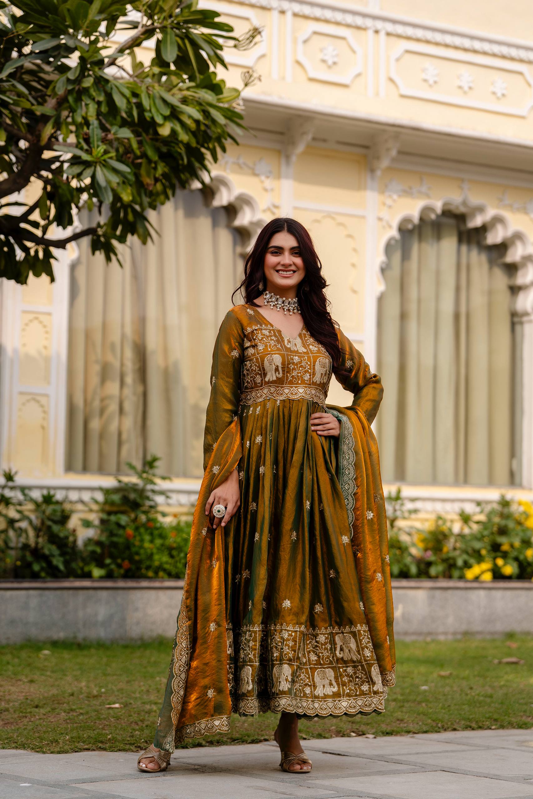 Krishnaveni olive green fendy satin embroidered gown with dupatta