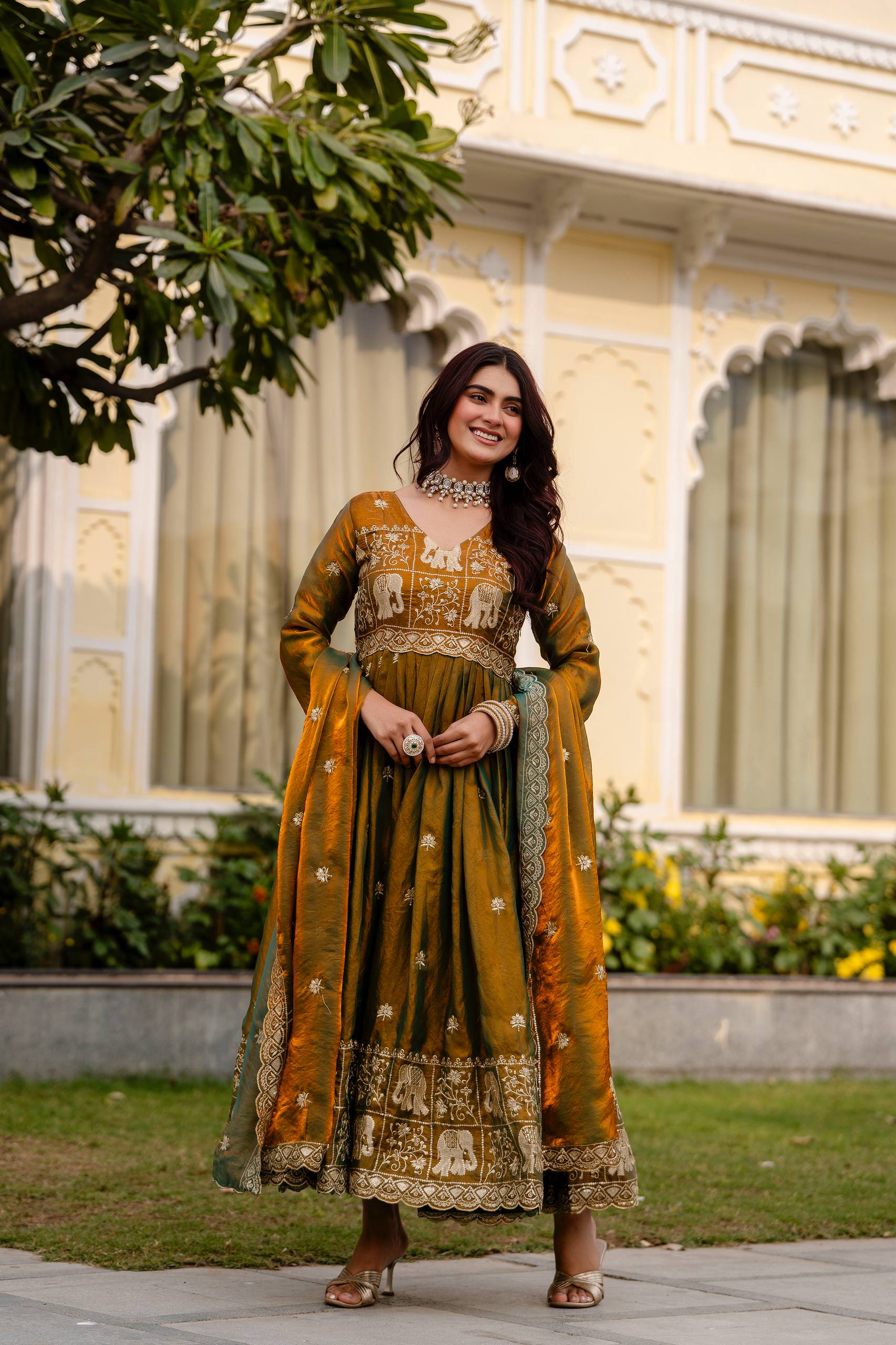 Krishnaveni olive green fendy satin embroidered gown with dupatta