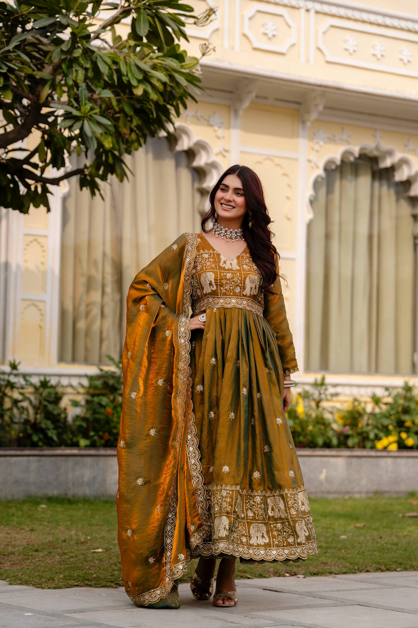 Krishnaveni olive green fendy satin embroidered gown with dupatta